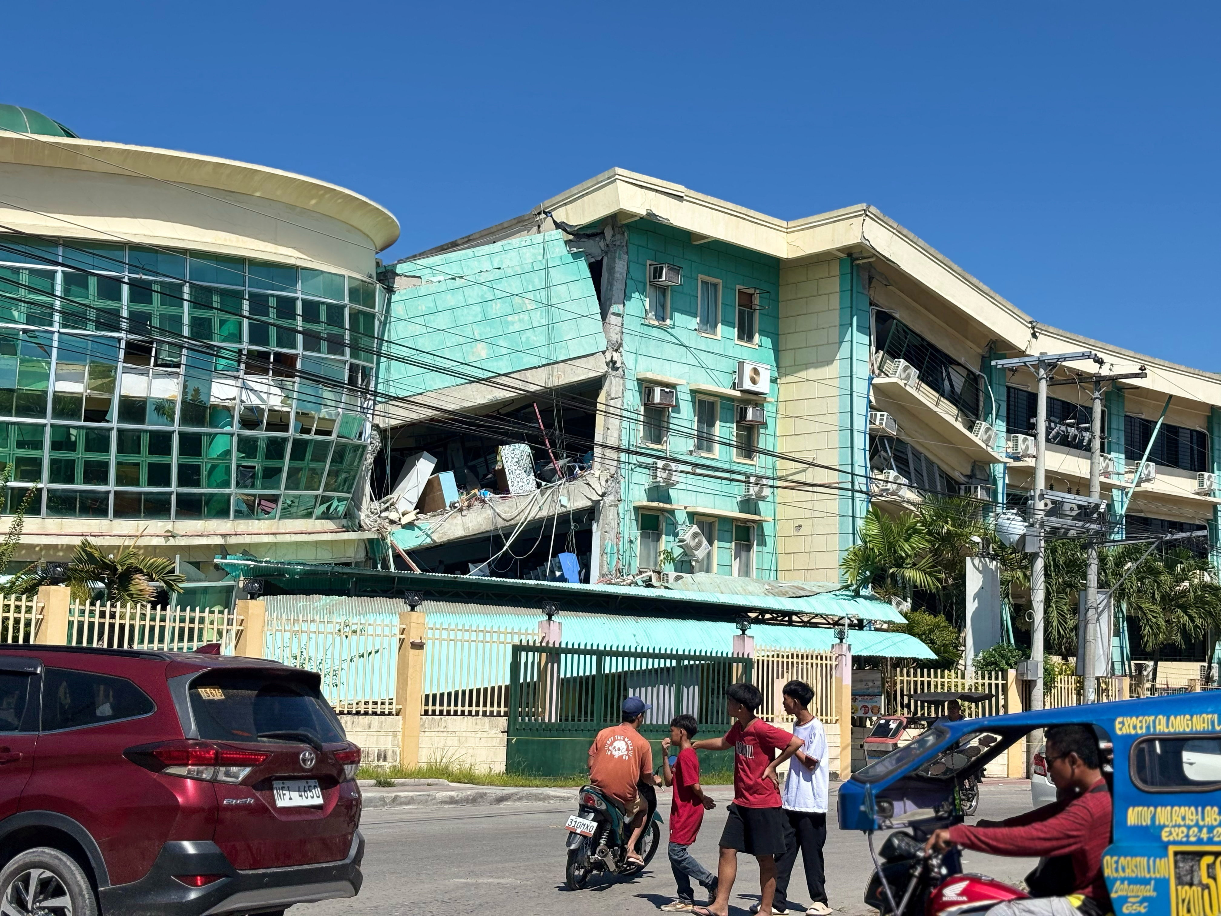 cover Eight reported dead after magnitude 7.8 earthquake in Philippines