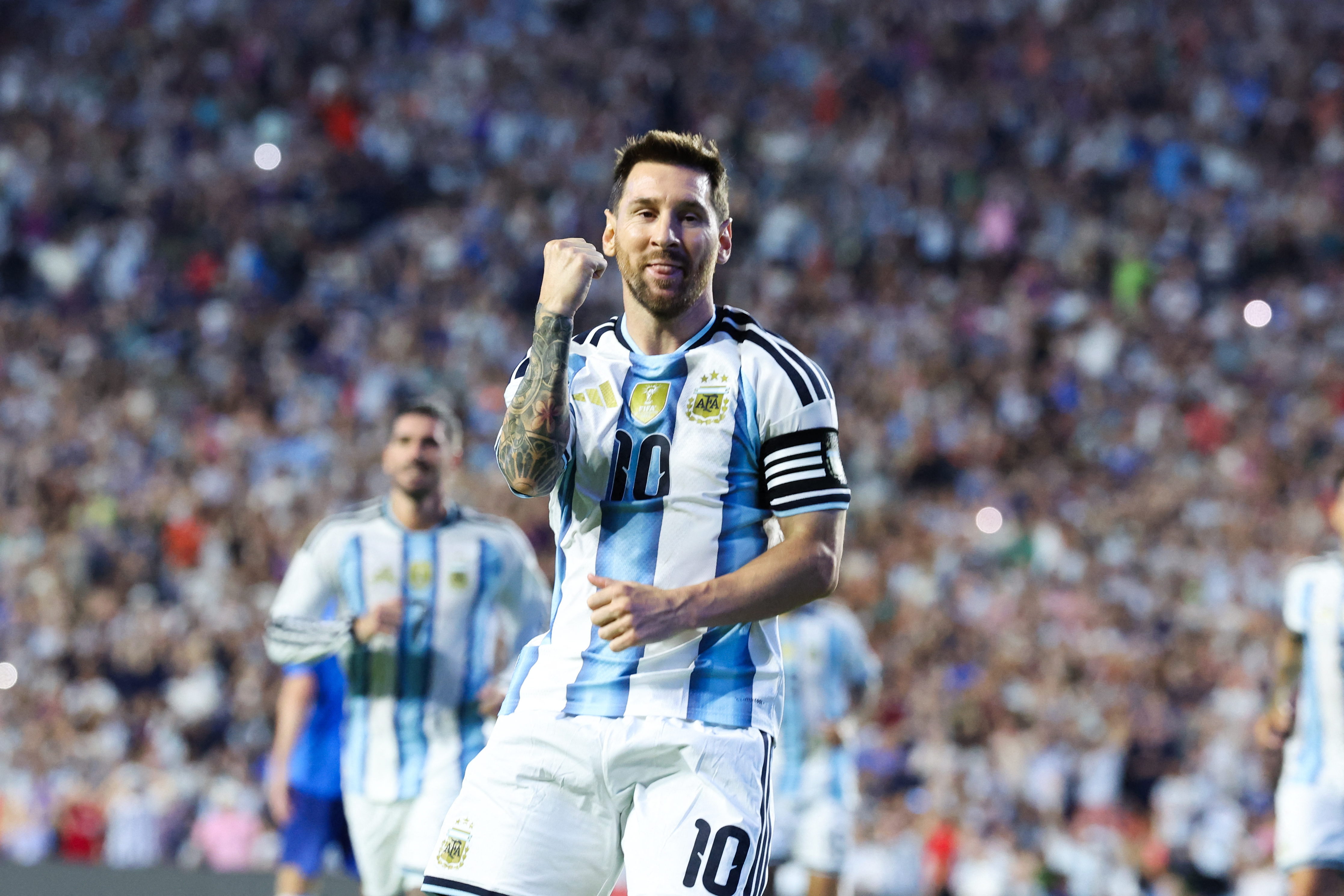 cover Messi eyes history as Argentina begin title defence against Algeria