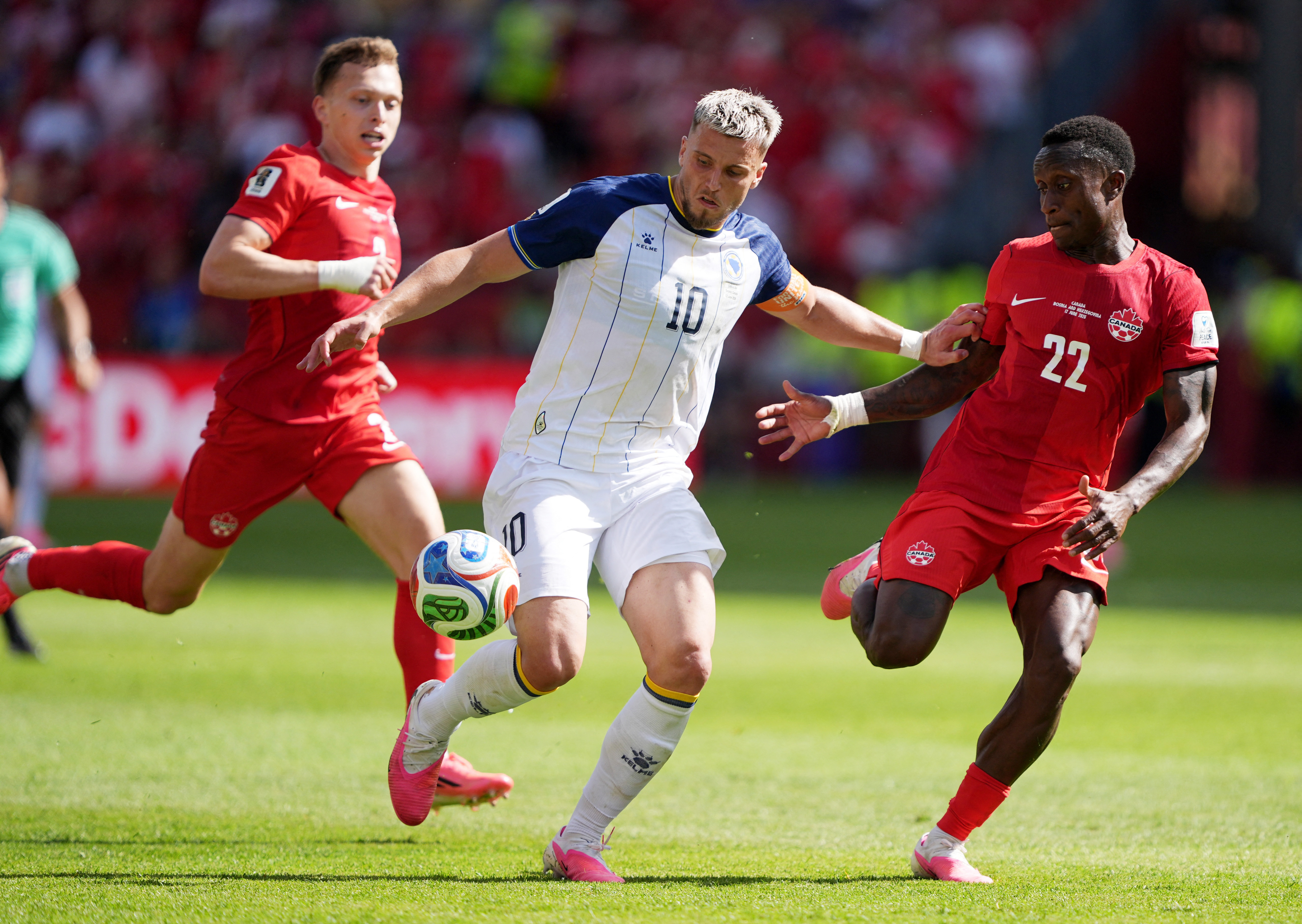 image Canada&#8217;s Larin rescues late draw against Bosnia in Group B opener