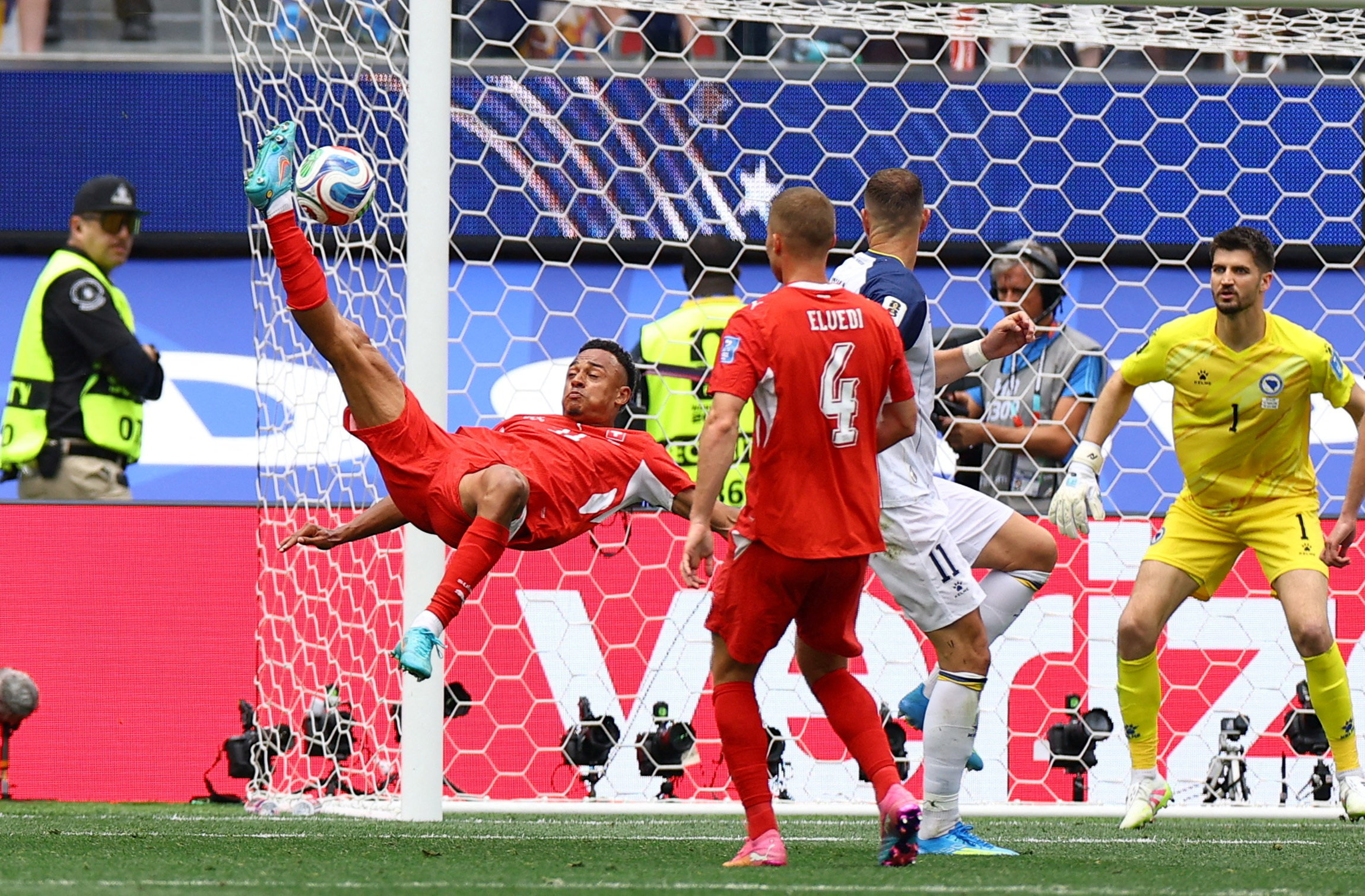 cover Group B: Canada crush nine-man Qatar 6-0, Swiss defeat Bosnia and Herzegovina 4-1