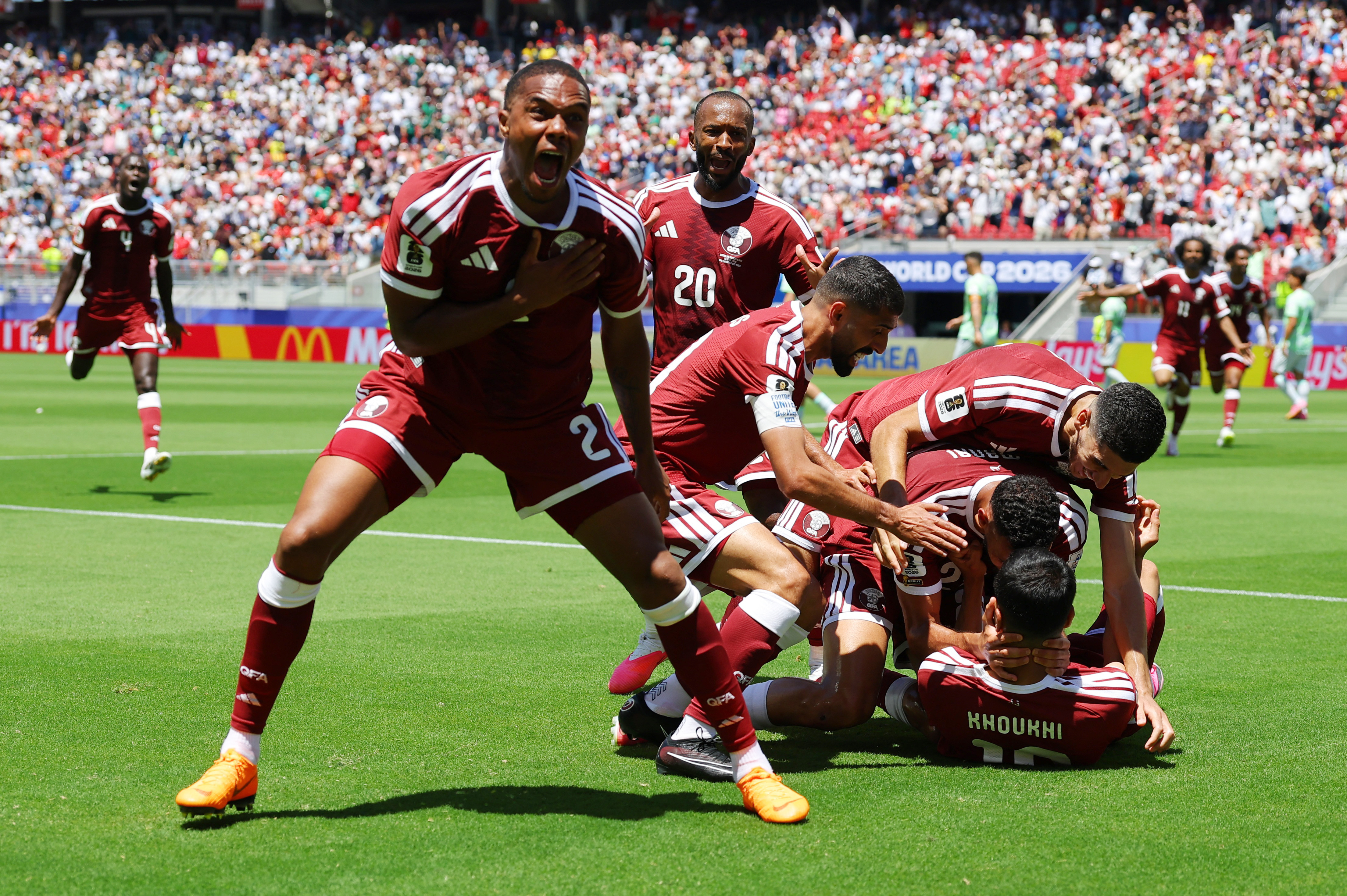 cover Group B: Qatar hail first World Cup point after late goal stuns Switzerland​ in 1-1 draw ​