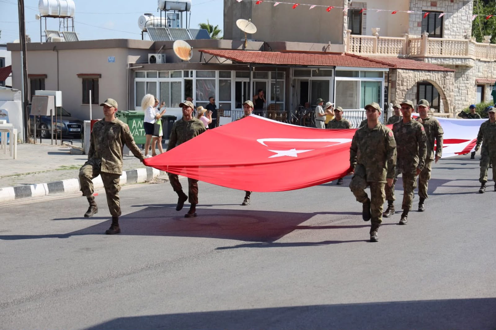 cover Turkish VP: Turkey brought peace to Greek Cypriots