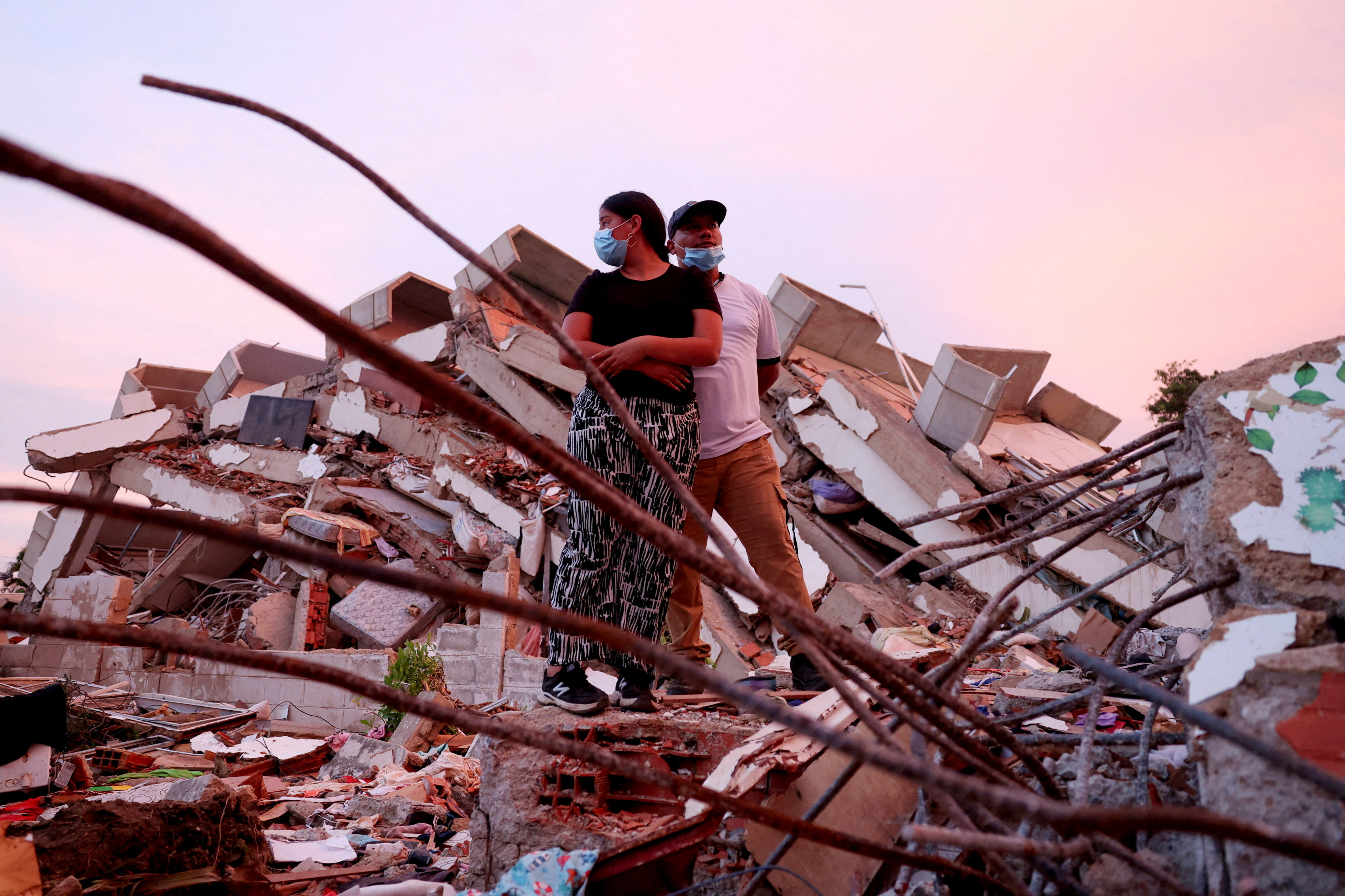 cover Between silence and shouts, rescuers dig for Venezuela twin quake survivors