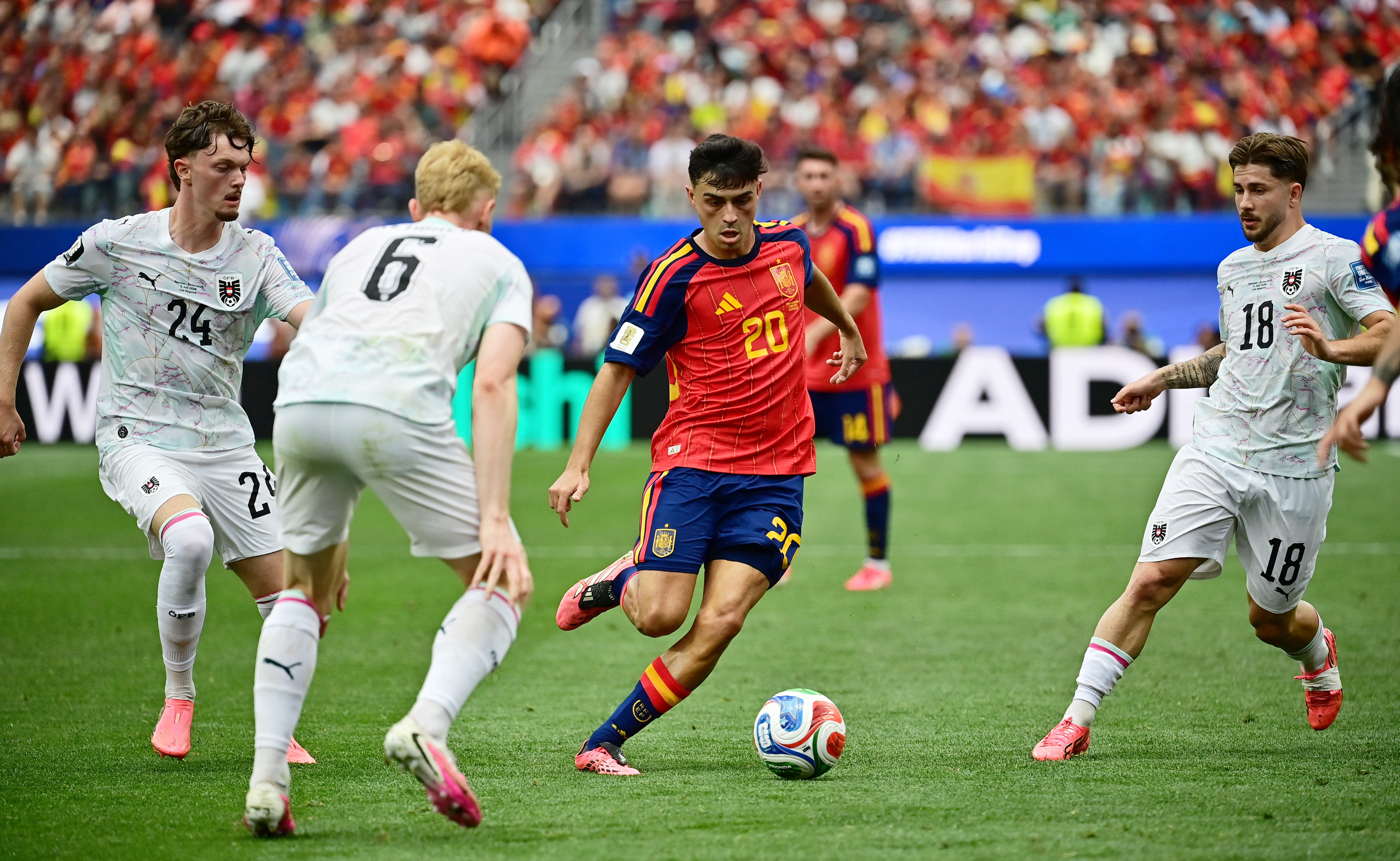 image Improving Spain outclass Austria 3-0 to ease into World Cup last 16