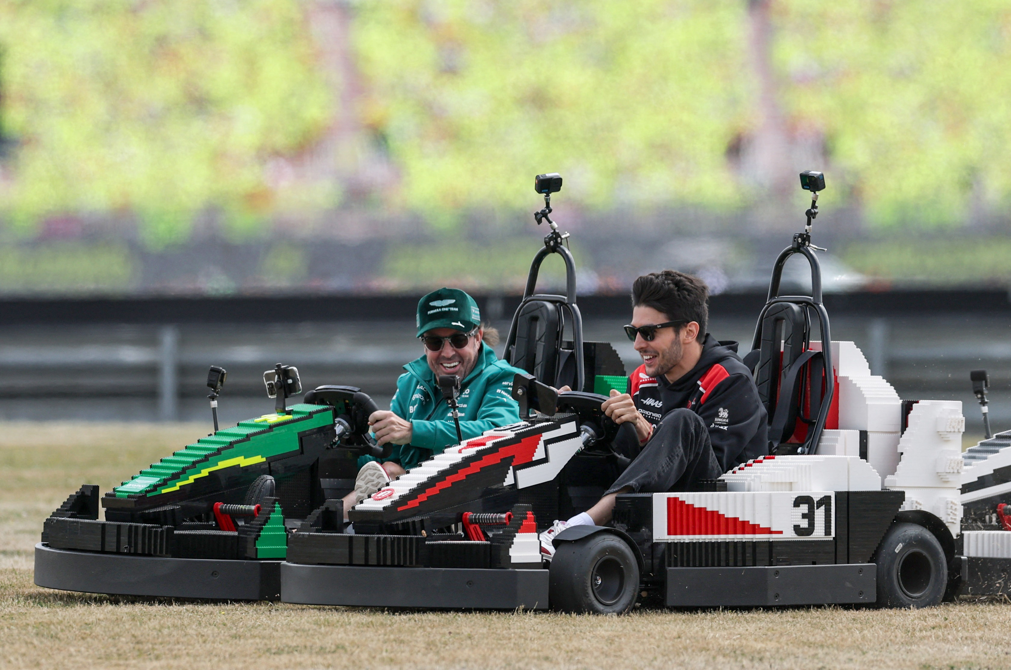 cover F1 drivers amuse British GP crowd with Lego car chaos