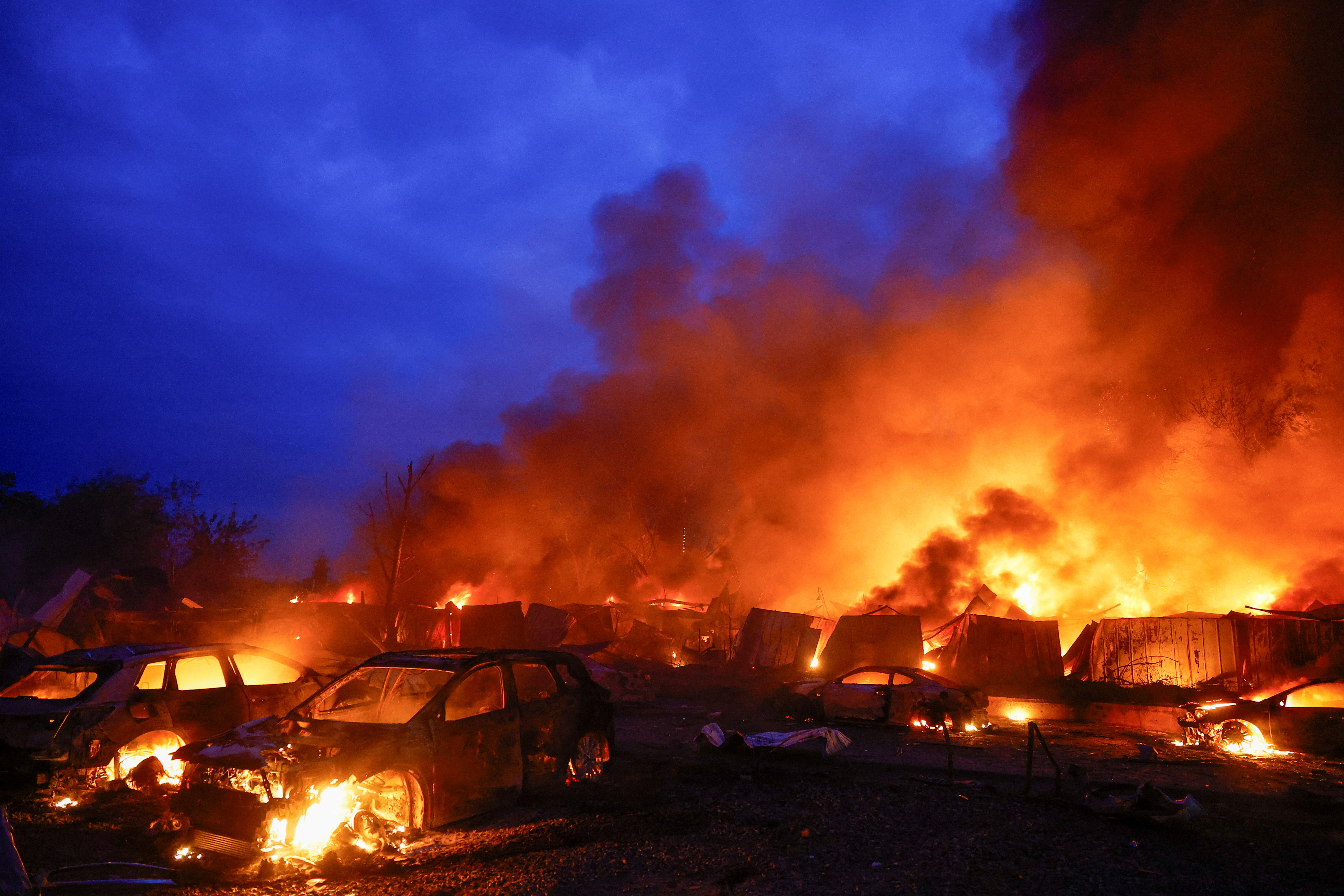 cover Russian attack on Kyiv kills nine, hits apartment buildings