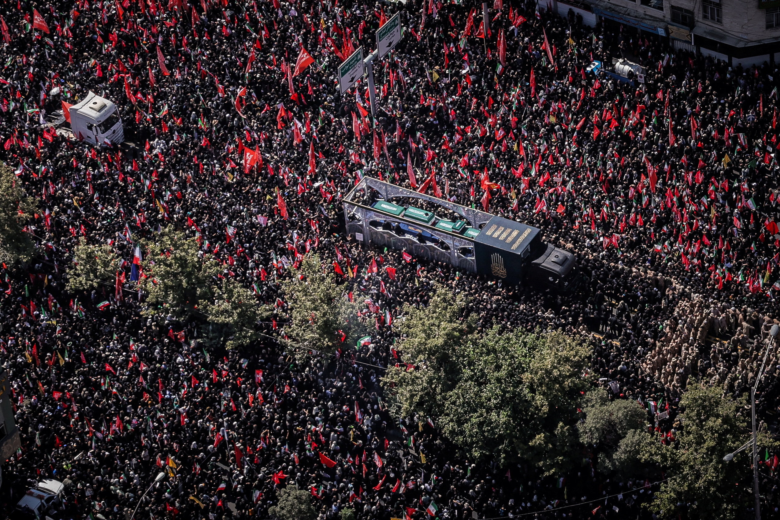 cover Iranian mourners call for vengeance on Trump during Khamenei funeral procession
