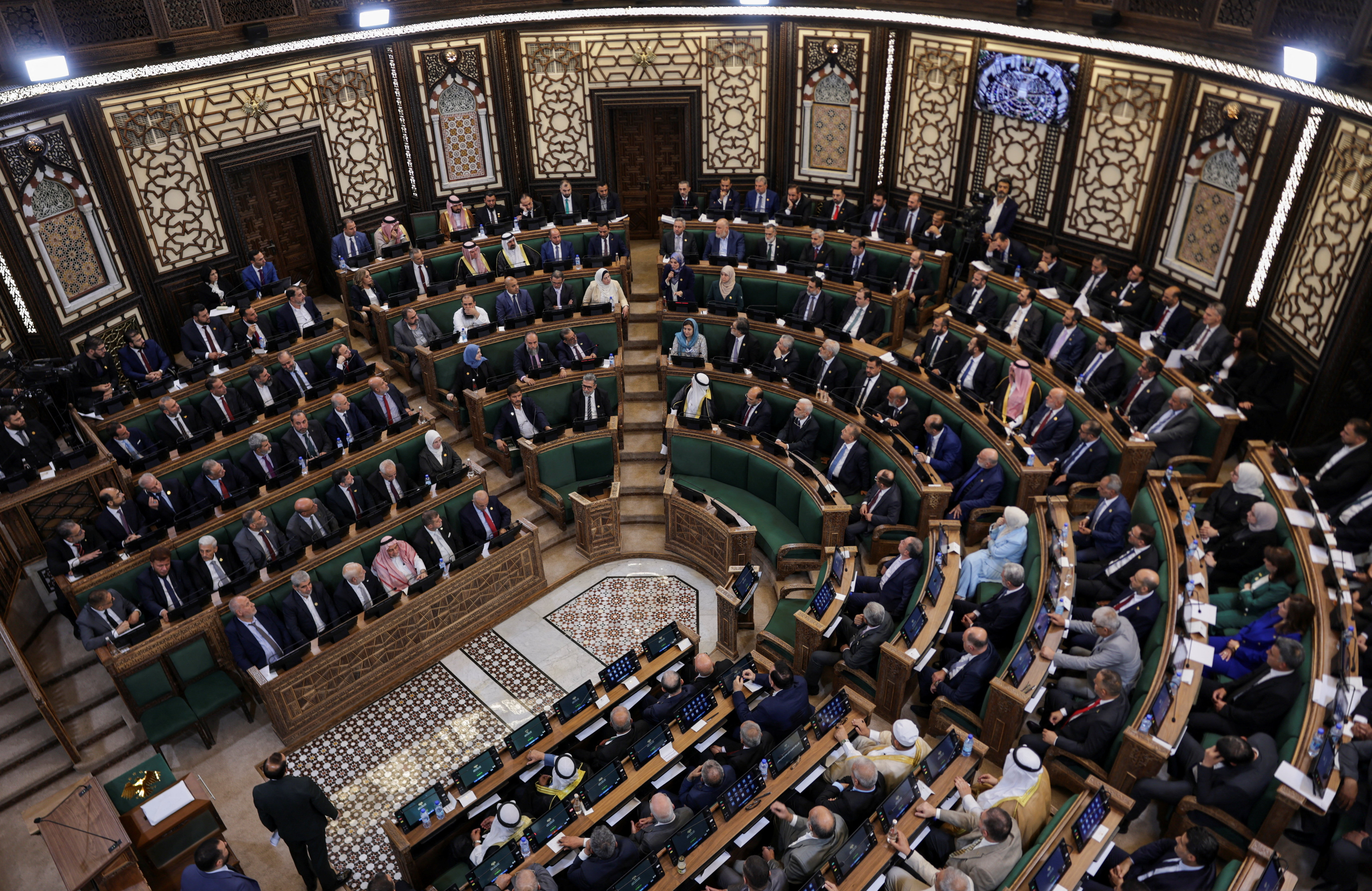 cover New Syrian parliament meets for first time in Damascus