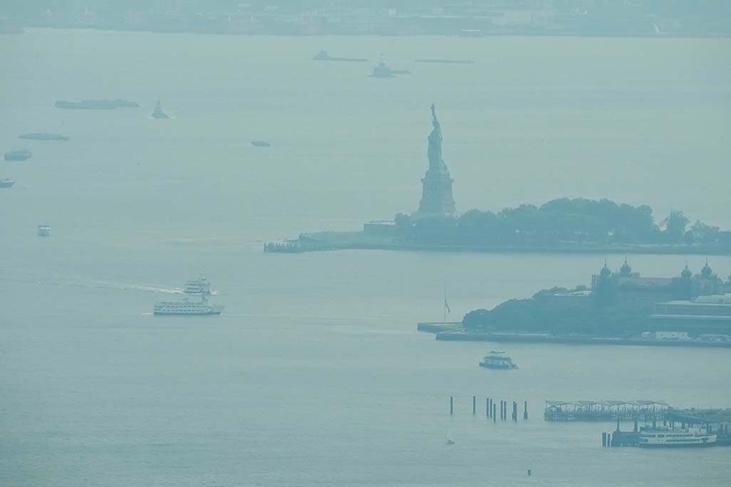 cover Smoke, fire, floods: US faces triple extreme summer weather threats