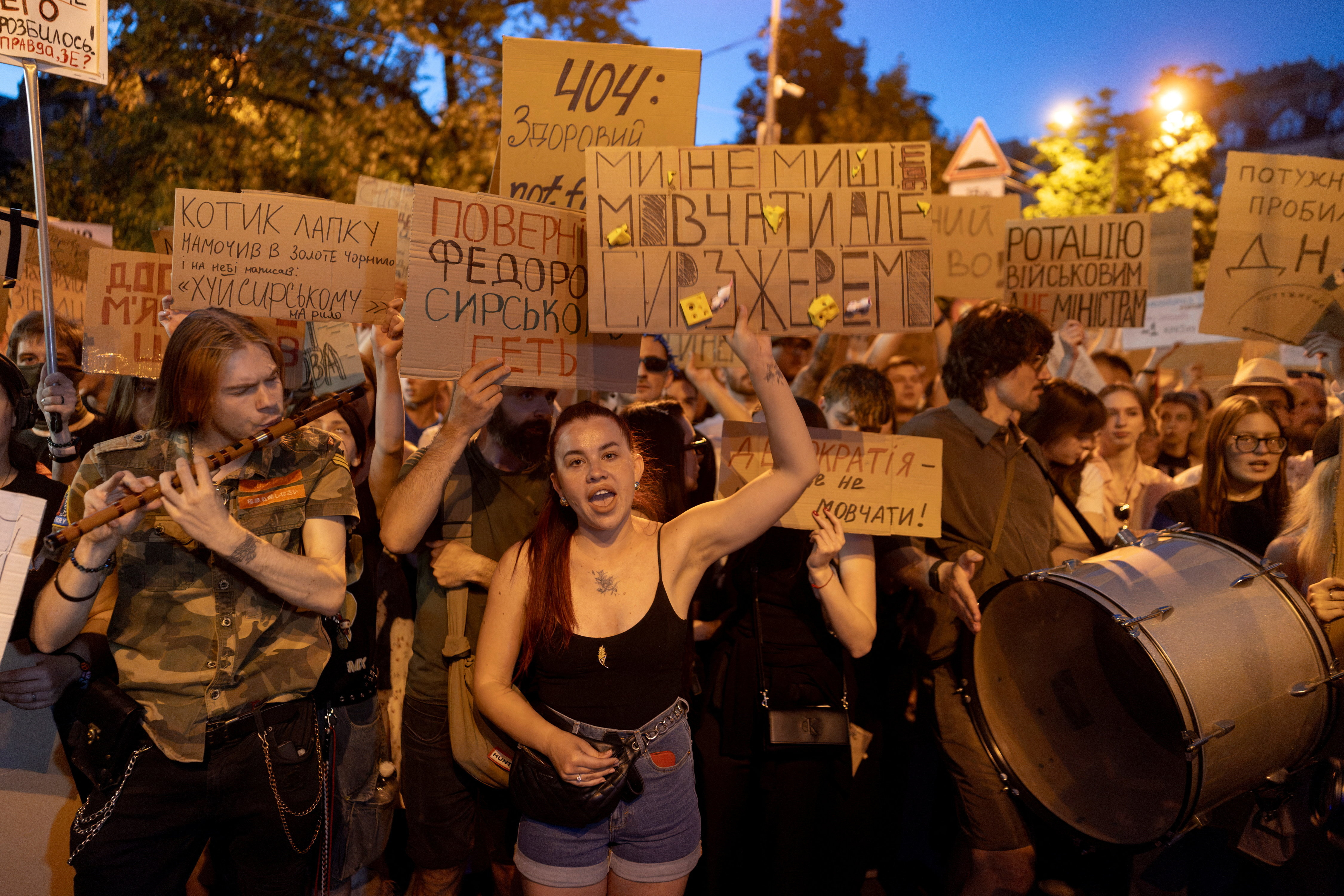cover Ukraine&#8217;s Zelenskiy meets commanders as street protests mount