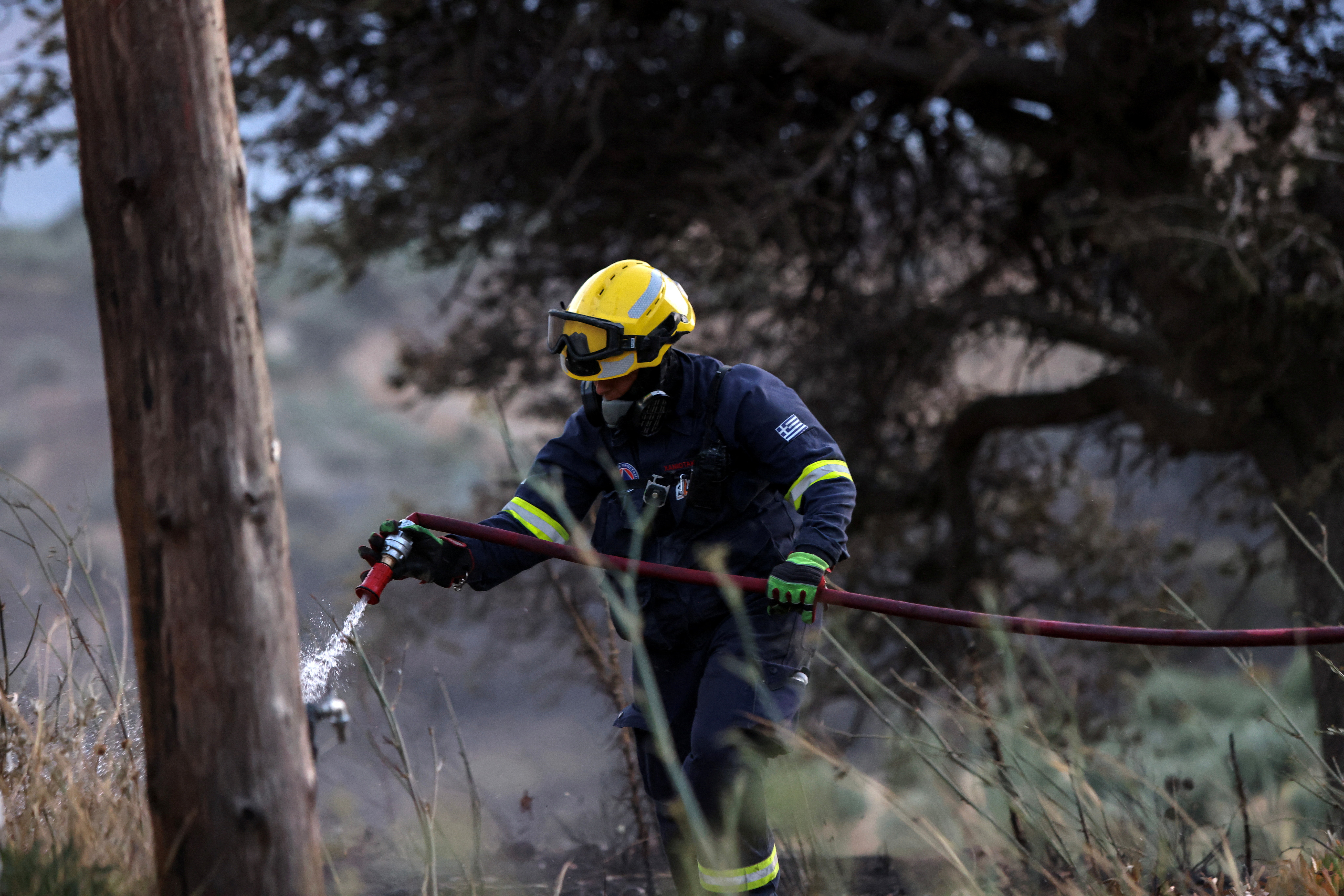 cover Three Greek firefighters killed as wildfires strike further east in Europe, arson arrests in Bordeaux fire