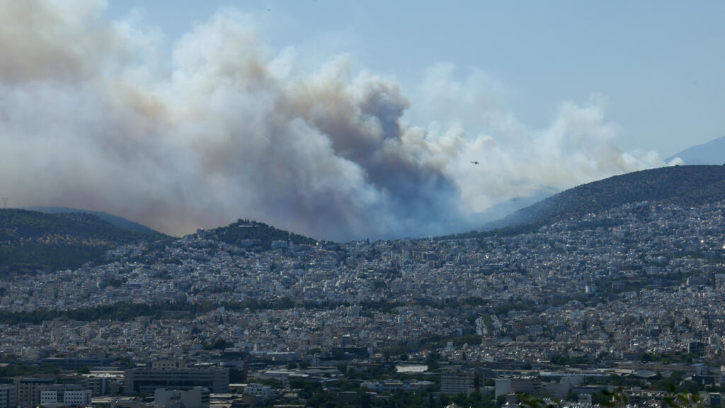 cover Greece battles wildfires near Athens