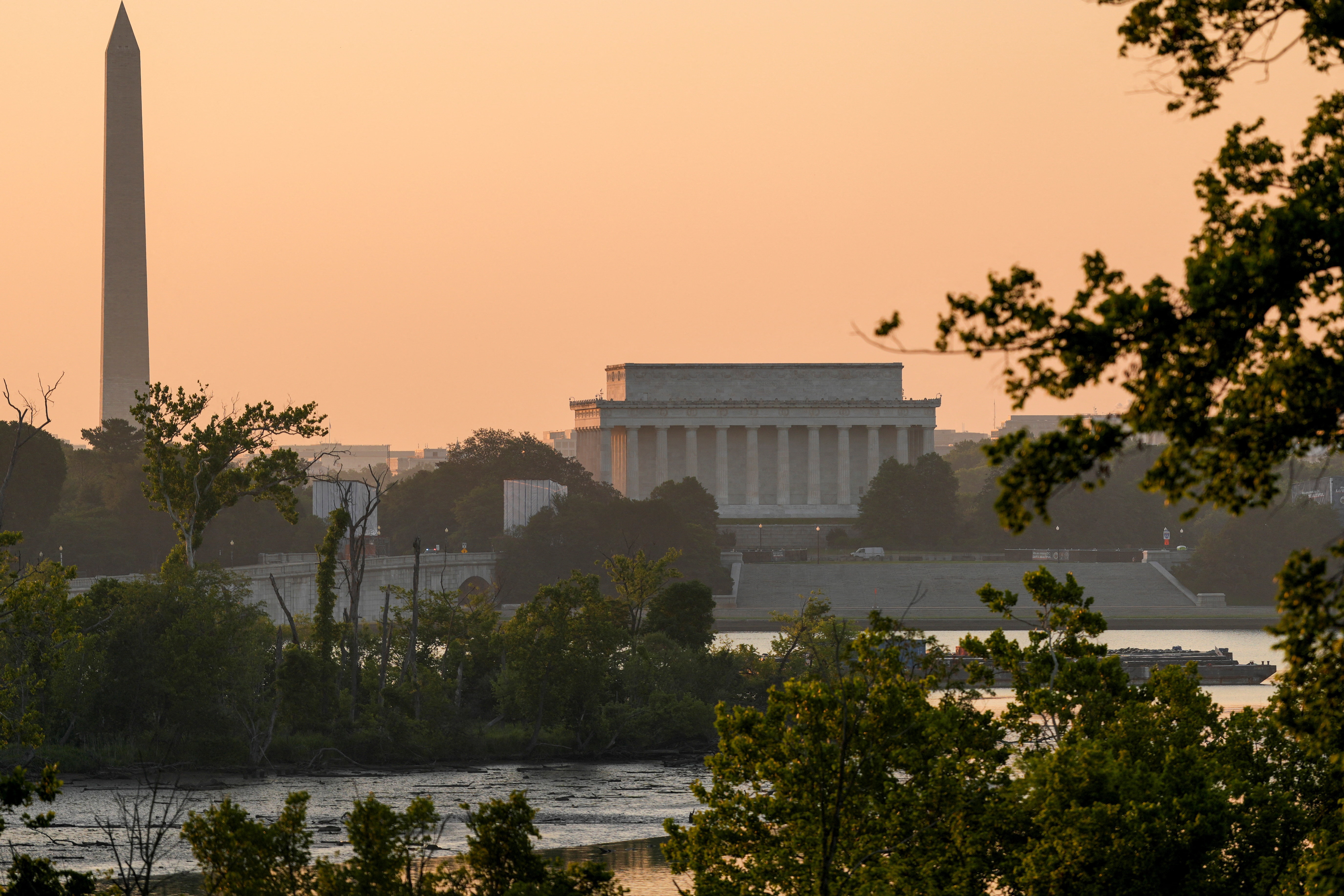 cover Heat wave disrupts Fourth of July events across US, strains power grids