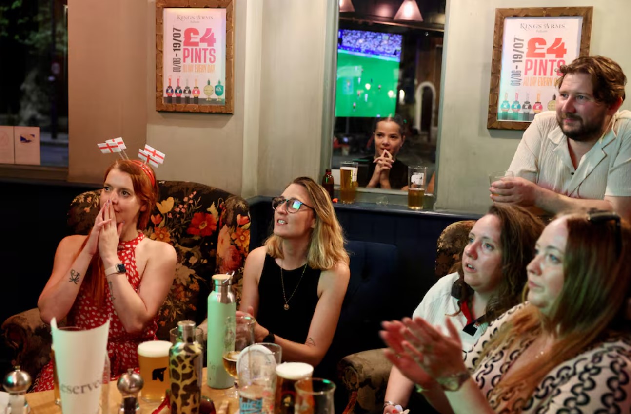 cover Heatwave and World Cup drive rise in British consumer spending