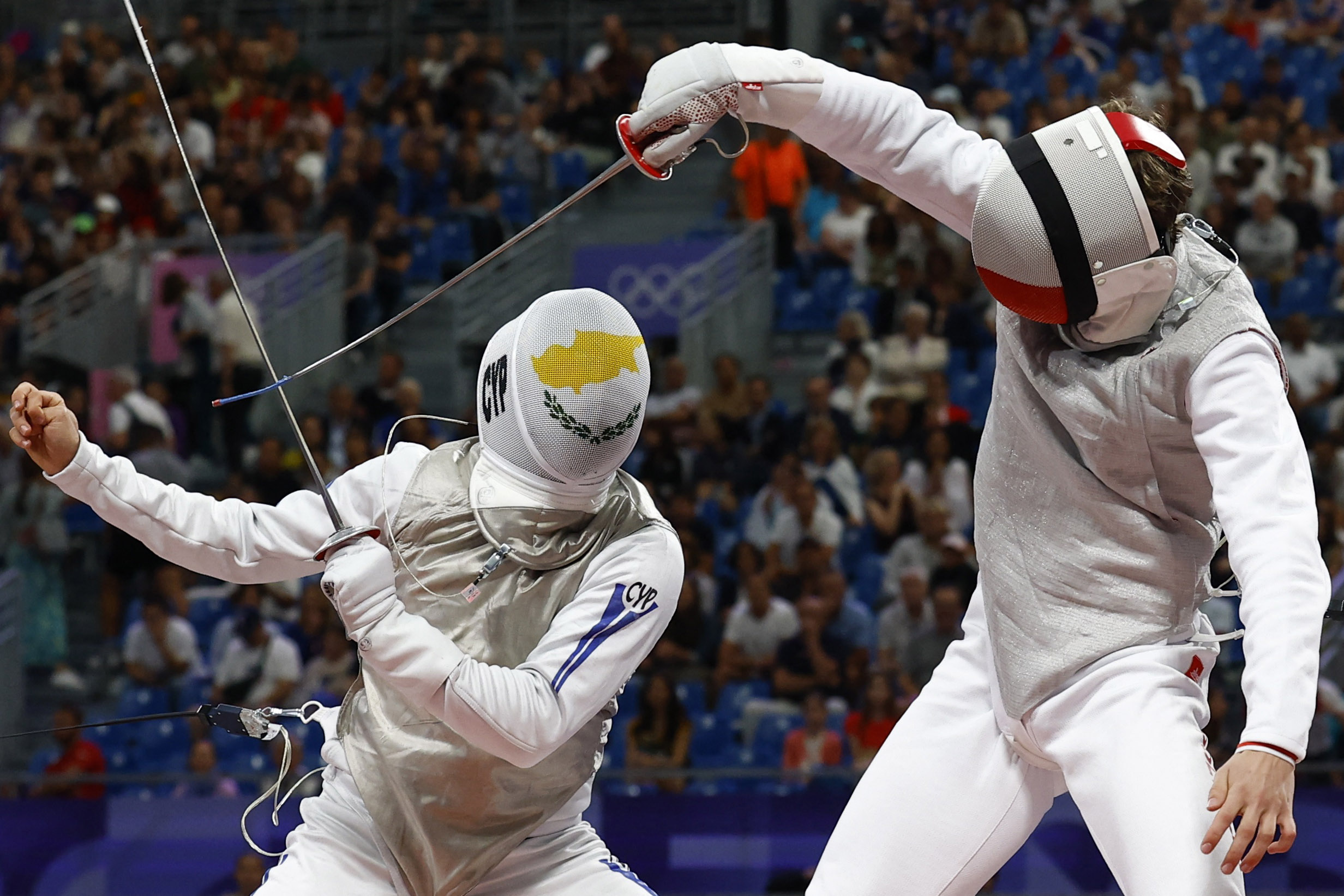 cover Cypriot fencer Tofalides in Hong Kong for world championships