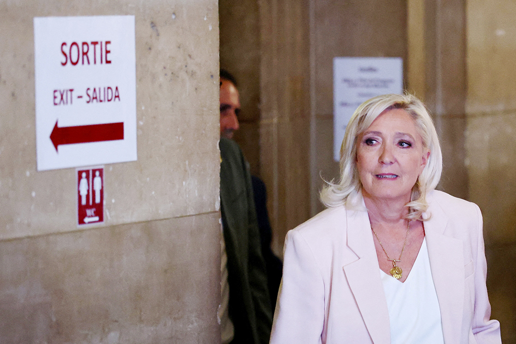 cover French court opens door for Marine Le Pen to run for president, with ankle tag
