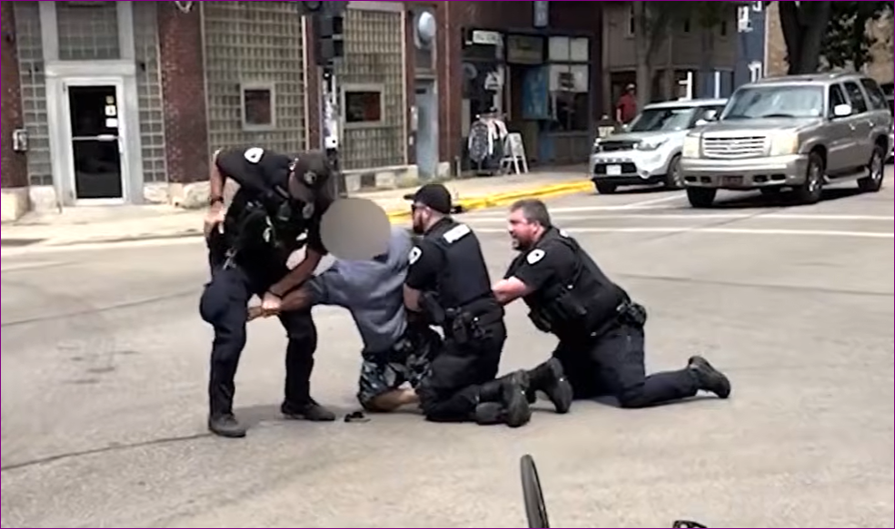 cover Police in Wisconsin shoot man dead; online video of killing sparks protests