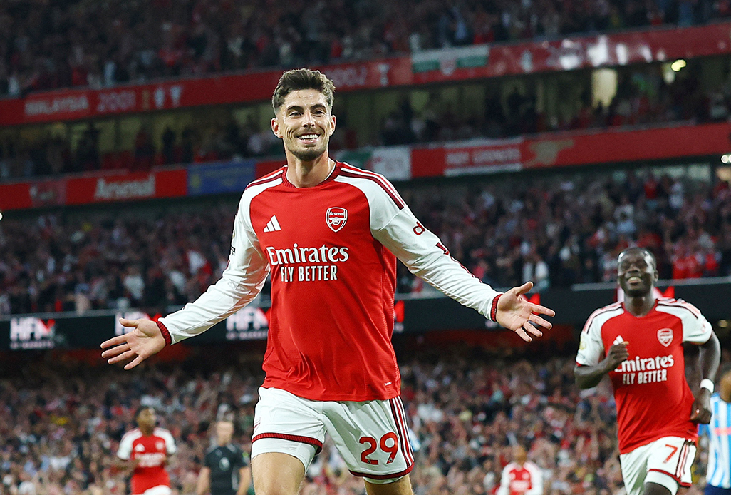 cover Arsenal sweep Coventry aside to start title defence with 3-0 win