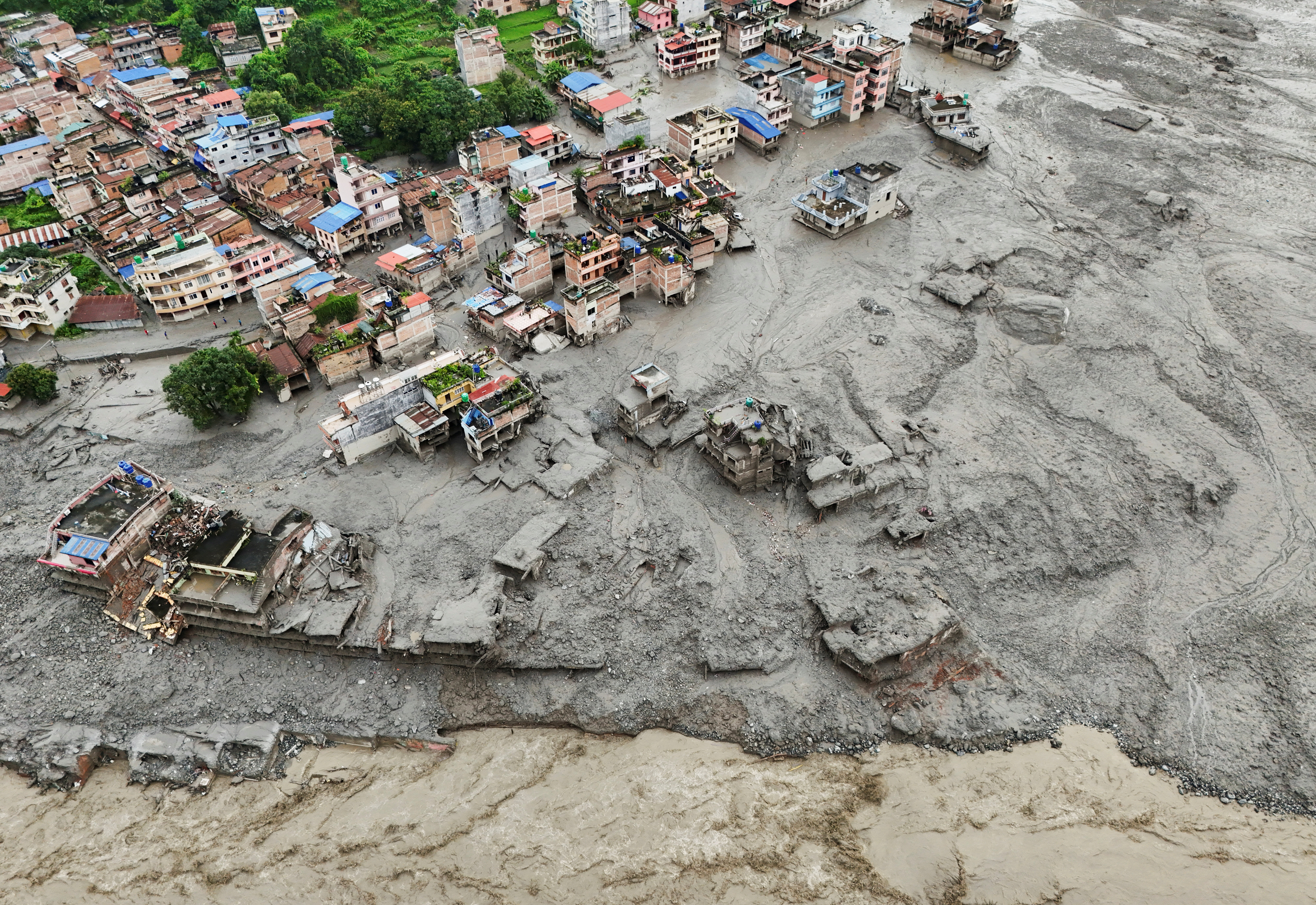cover Nearly 1,500 missing in Nepal and China after devastating Himalaya flood 