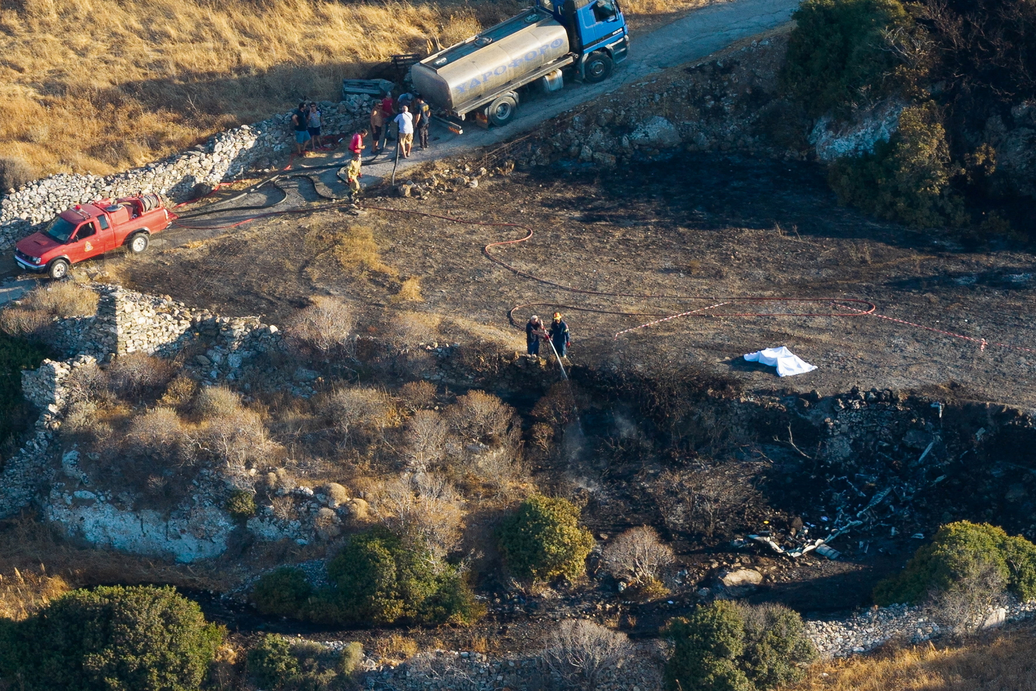 cover British couple and Greek pilot killed in helicopter crash on Greek island