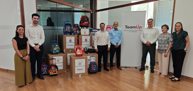 cover Eurobank staff participate in drive to get school supplies to needy children