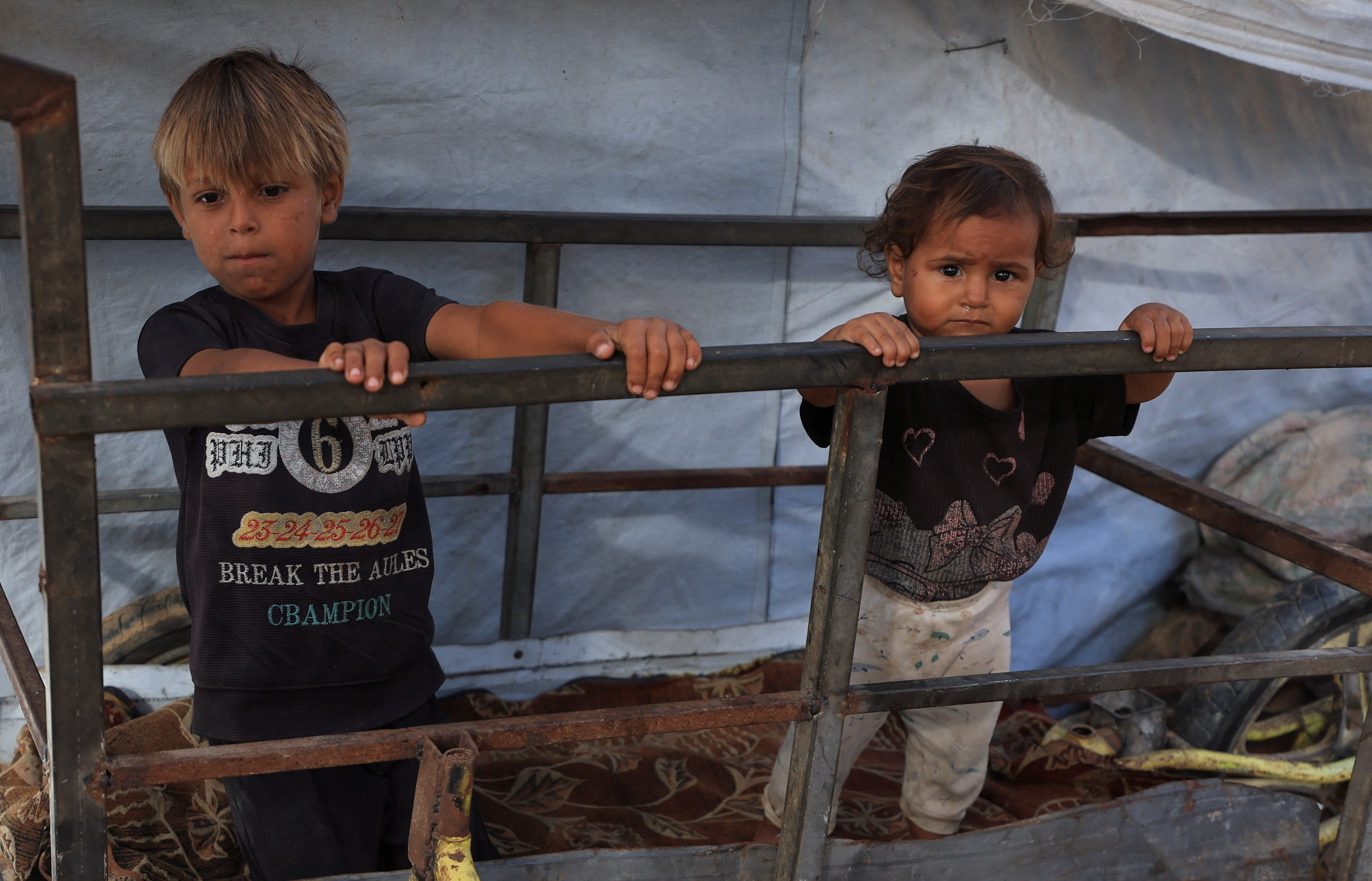 cover Israeli fire kills two young children in Gaza, medics say