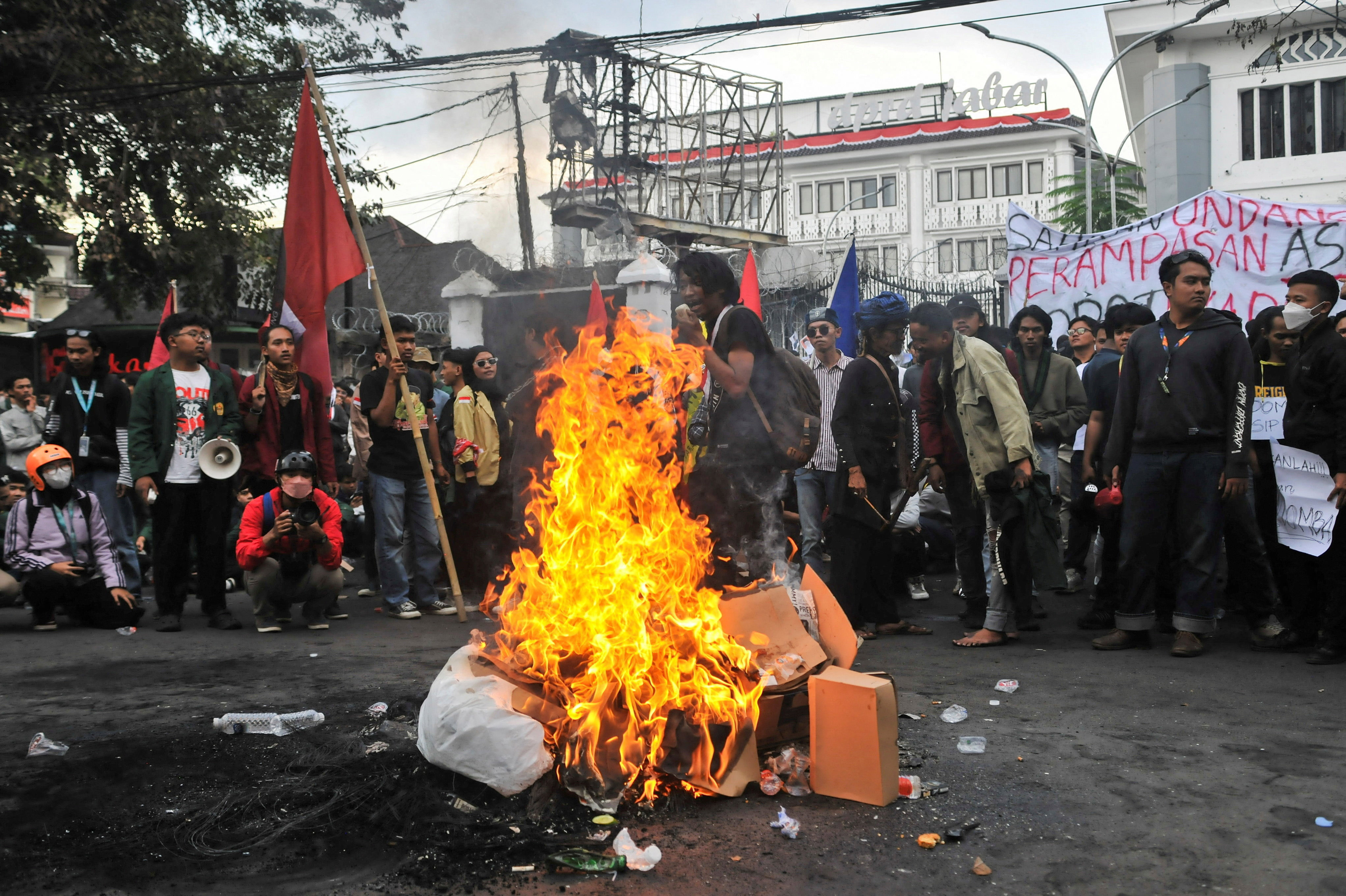 cover Indonesia tightens security as students rally one year after deadly protests