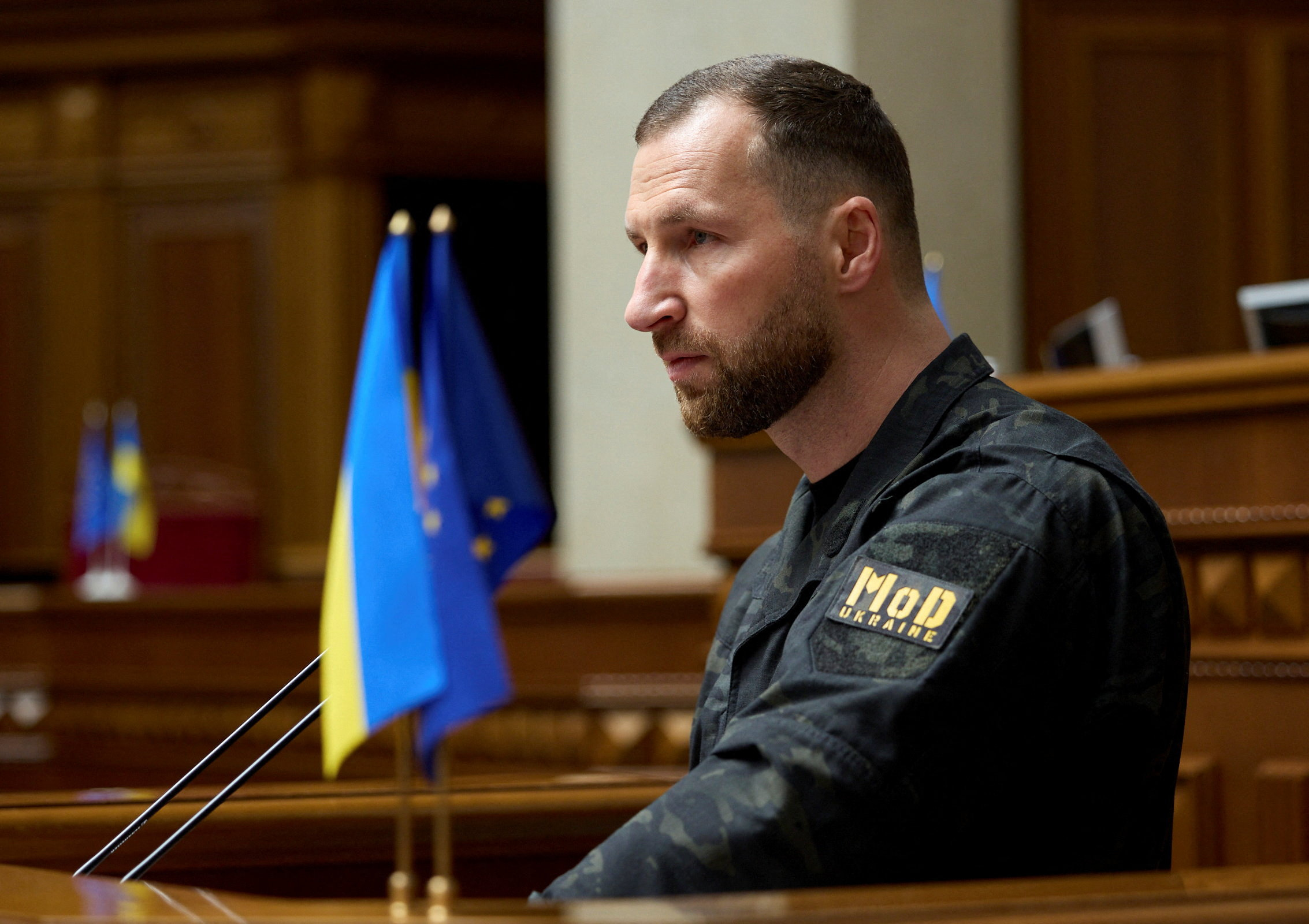 cover New Ukrainian defence minister takes office as ousted predecessor calls for wartime elections