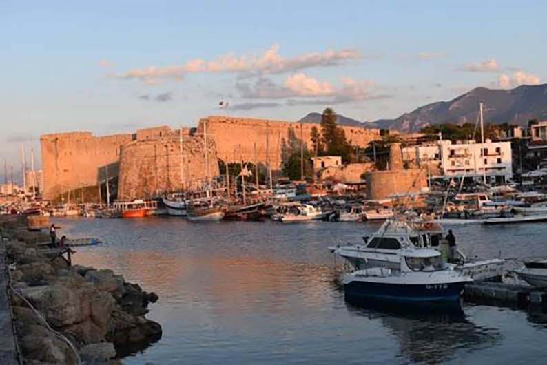 cover Tales from the Coffeeshop: Bringing people together undermines Cyprus’ reunification efforts