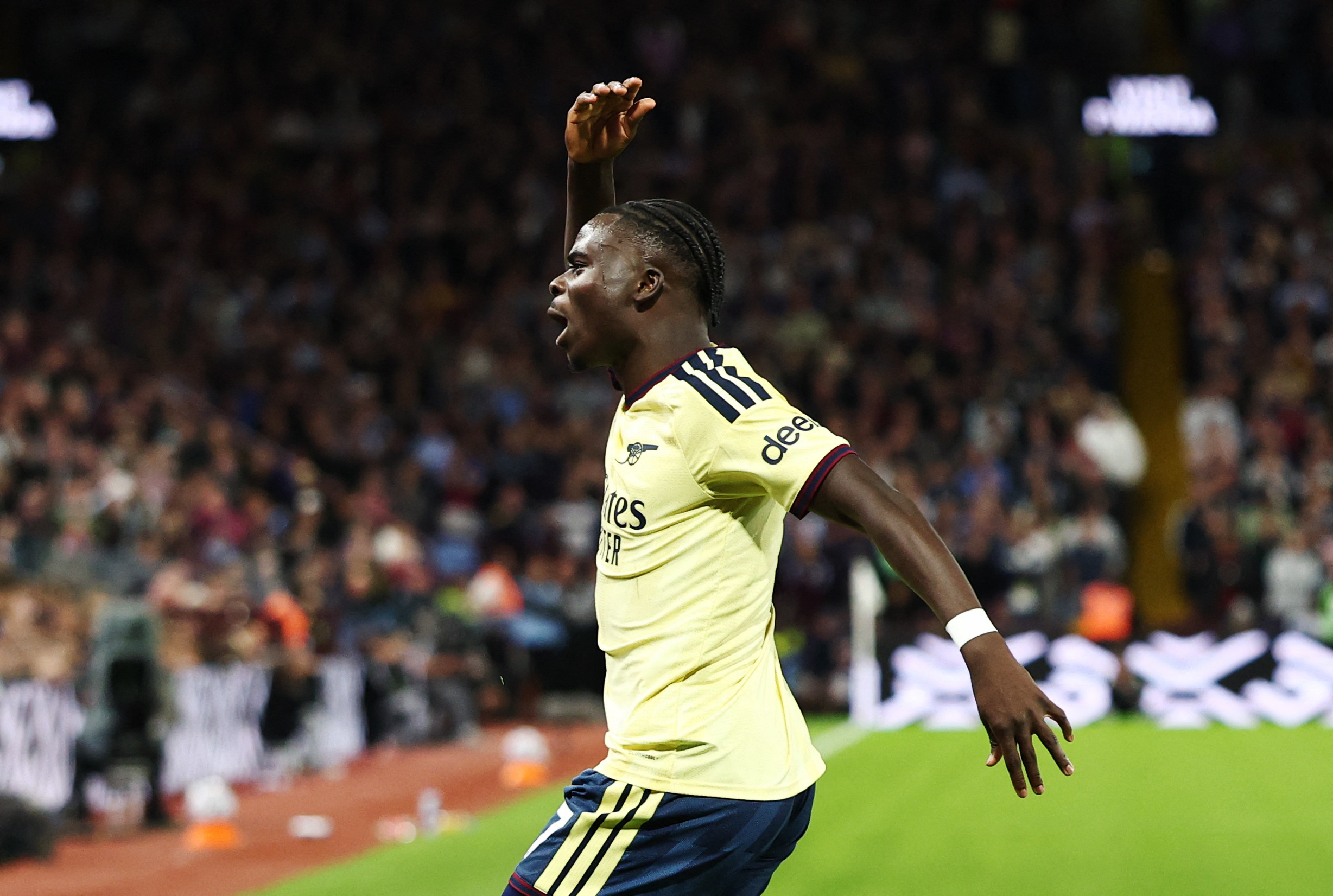 cover Saka earns Arsenal narrow victory at troubled Villa
