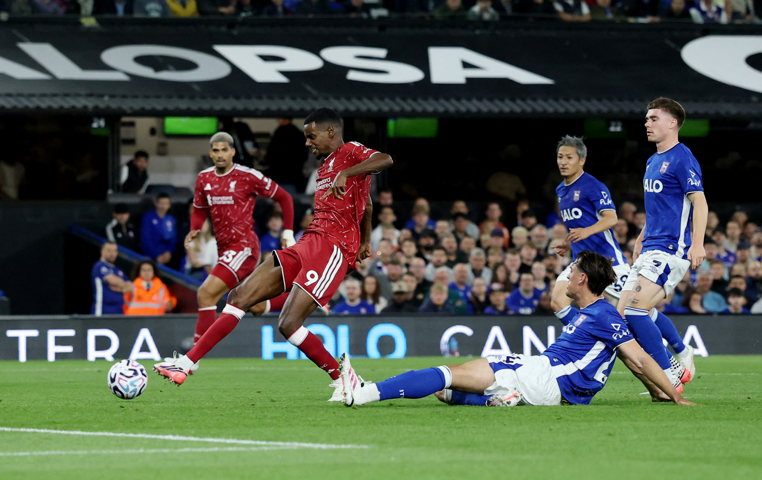 cover Early Isak double leads Liverpool to victory at Ipswich