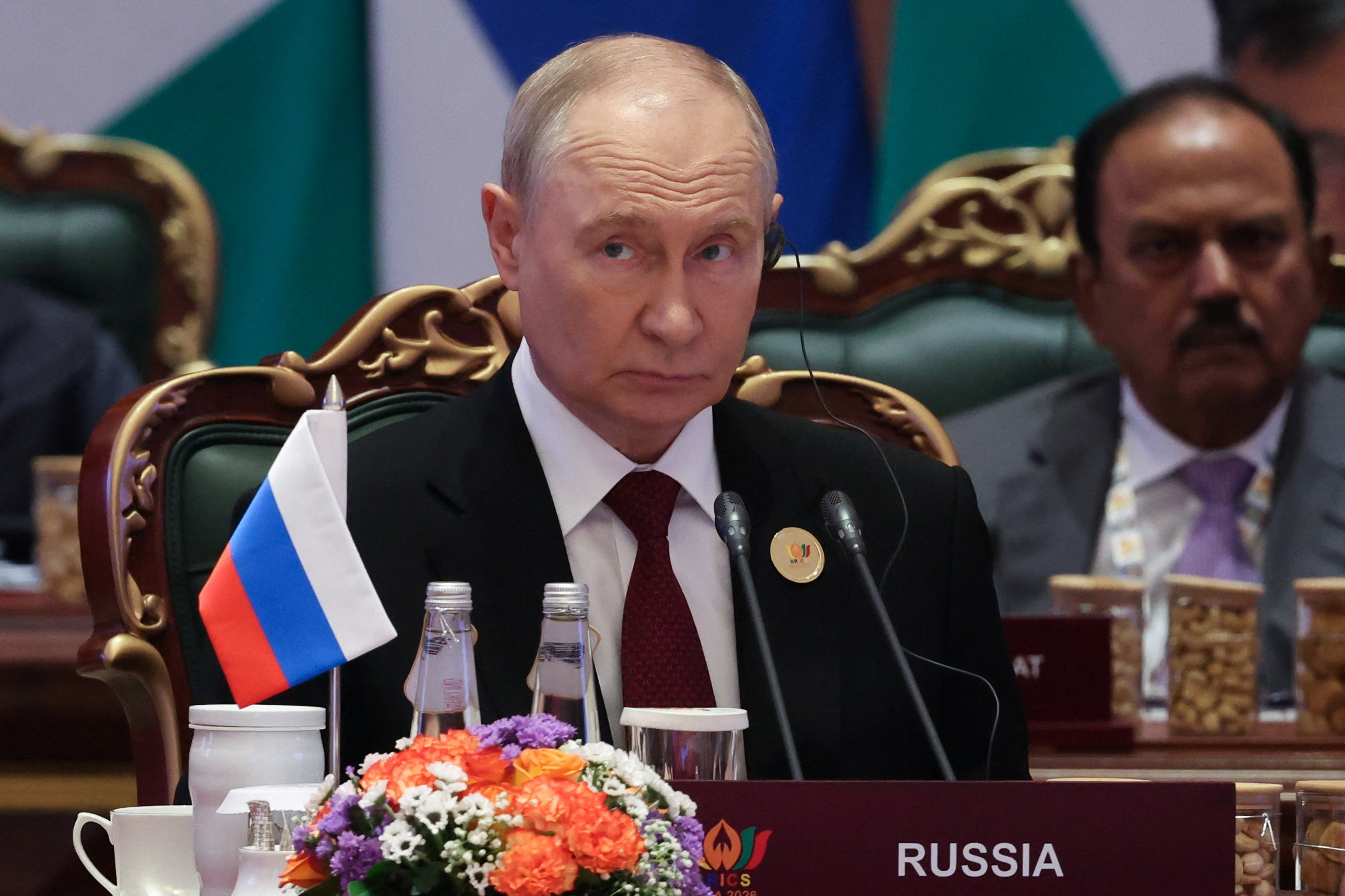 cover Putin says all Ukraine peace proposals on table, but Russia must weigh its interests