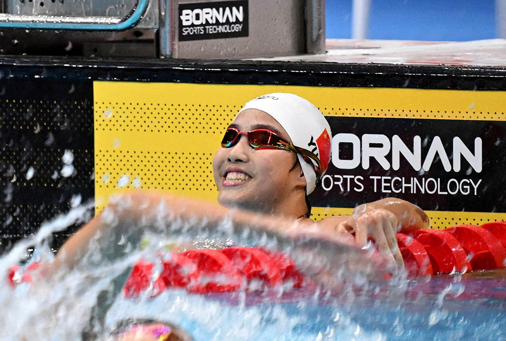 cover Swimming sensation Yu, 13, fuels China&#8217;s Asian Games gold rush