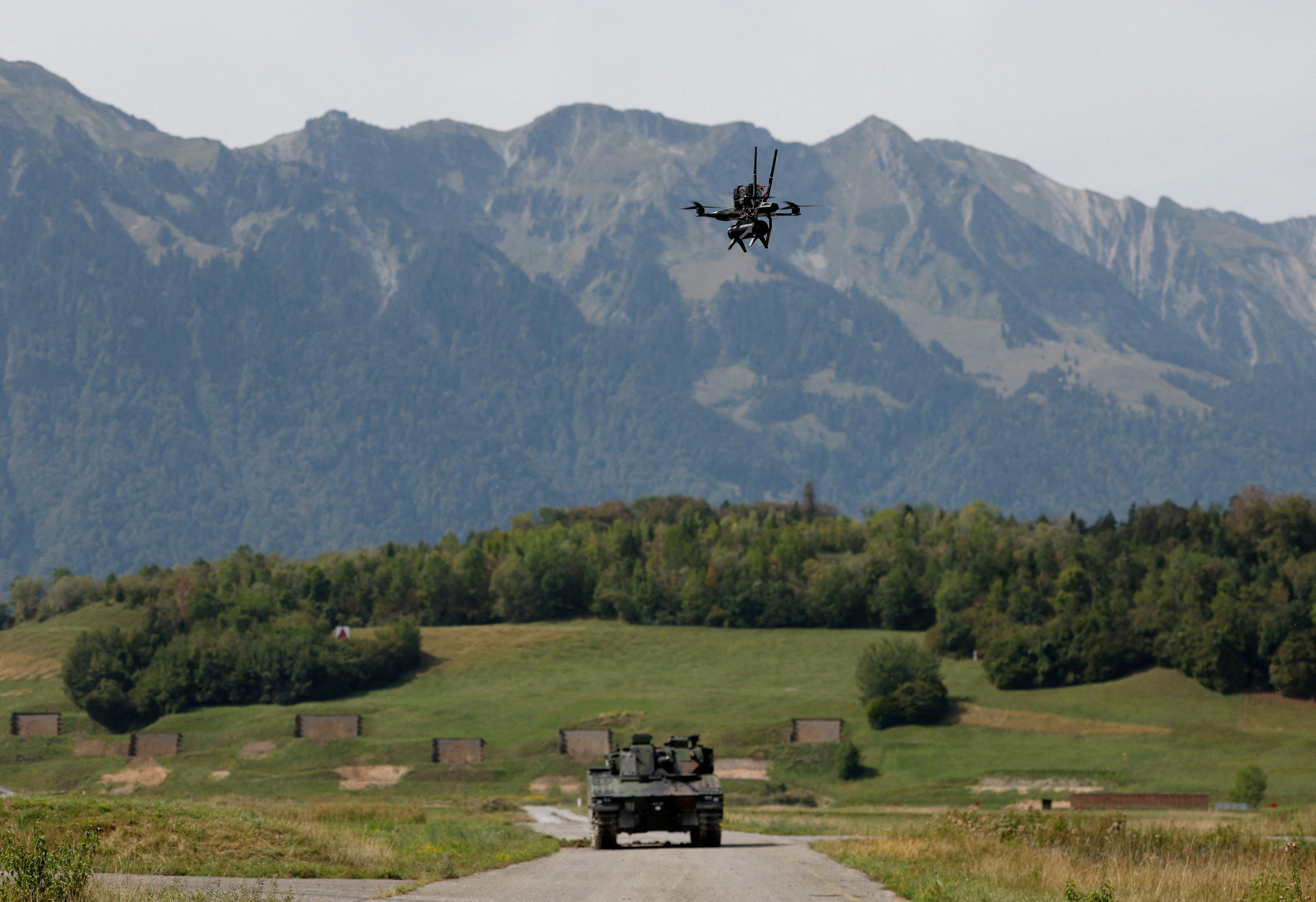 cover Swiss voters set to reject tighter neutrality rules that would curb Nato cooperation