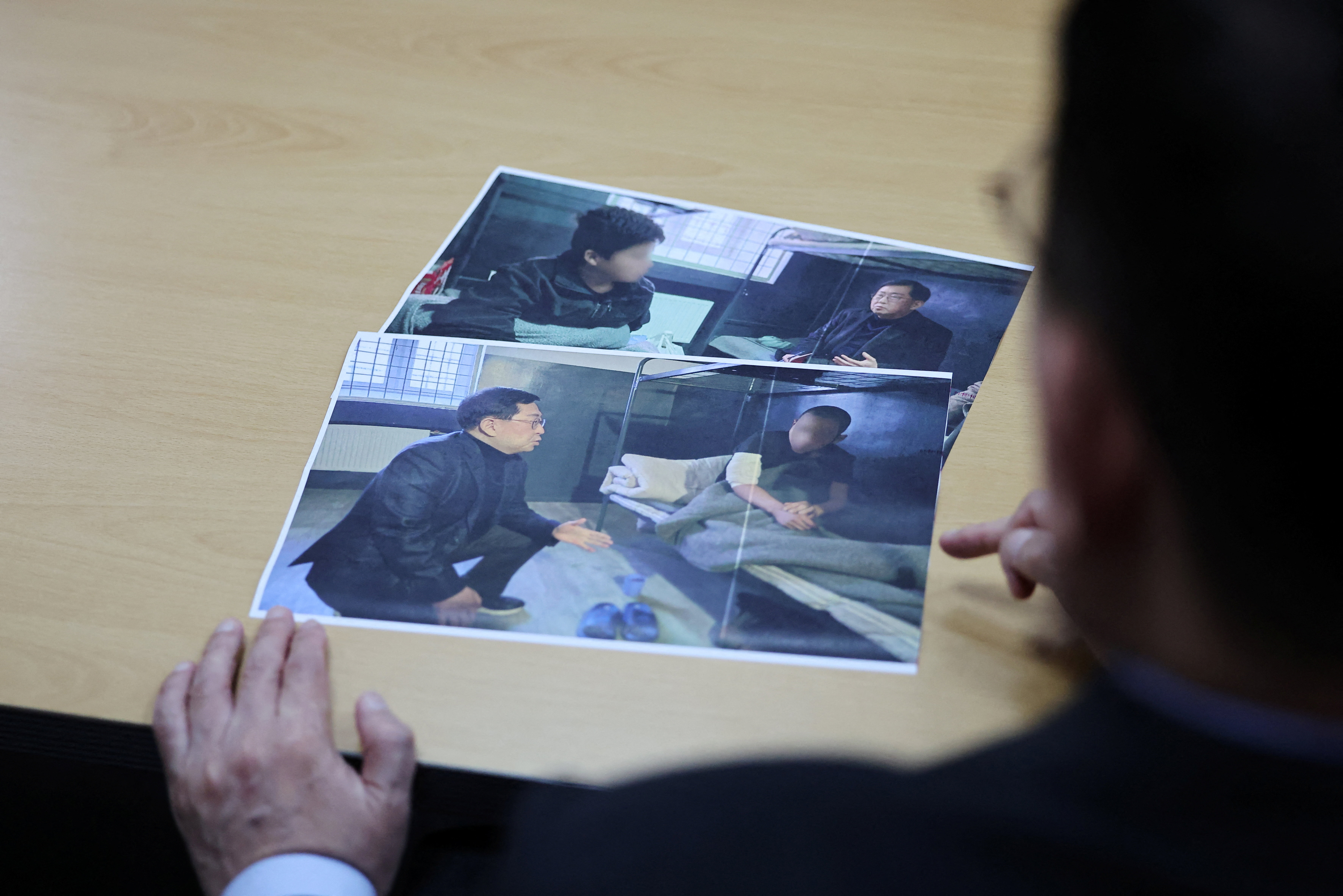 cover South Korea summons Ukraine envoy in protest over North Korean POW transfer