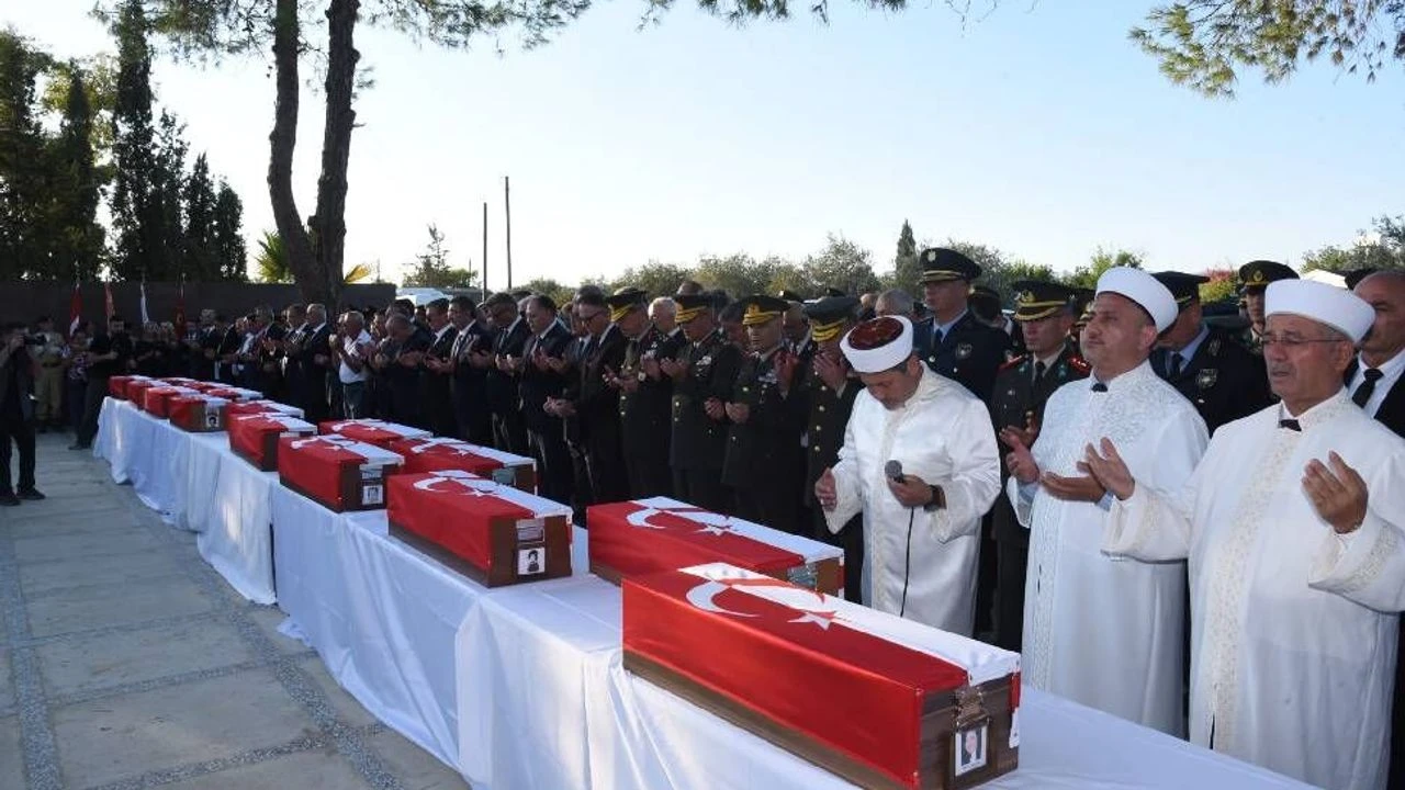 cover Funerals held for 15 missing persons from Aloa massacre