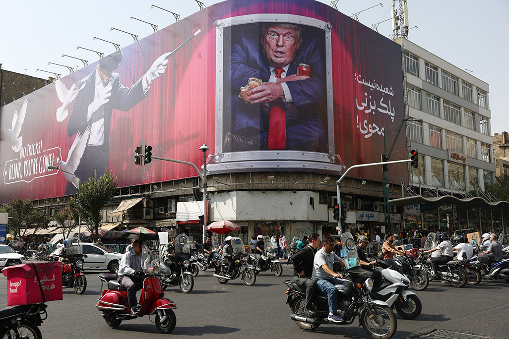 cover Iran urges US to comply with interim deal after Trump threatens further strikes