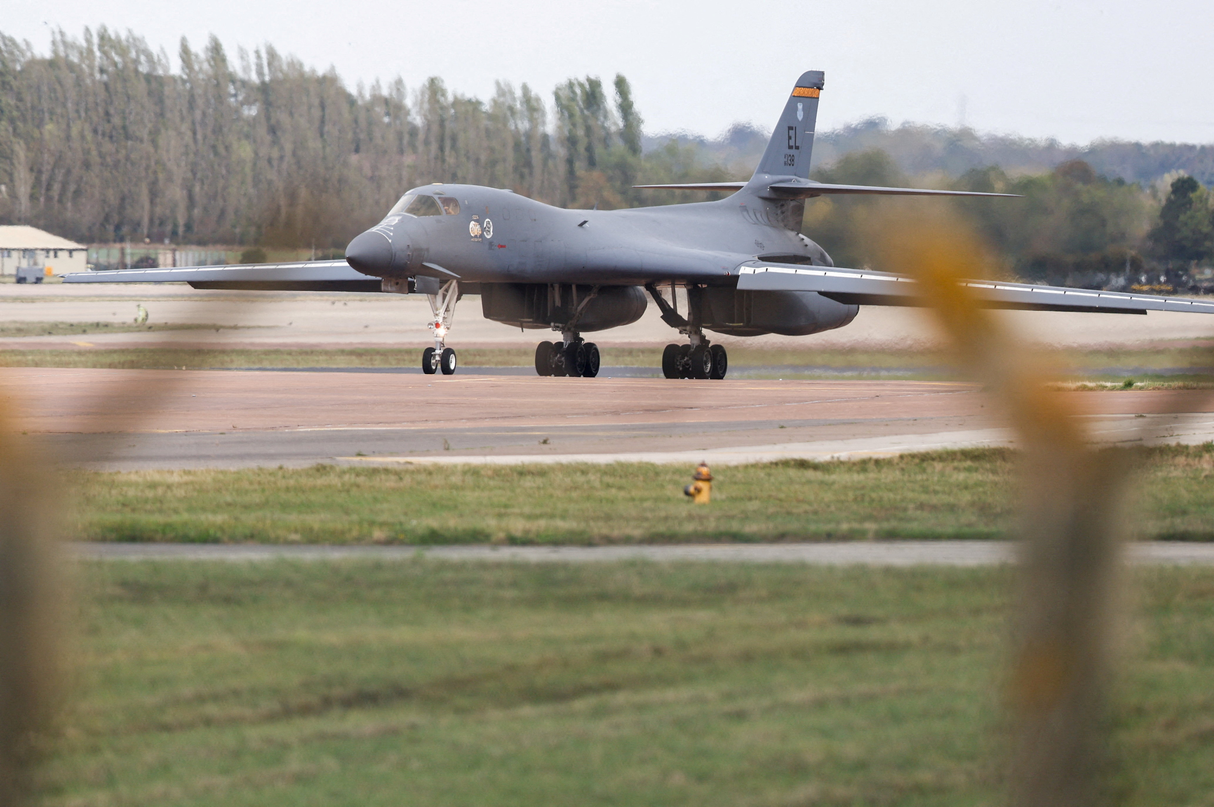 cover Two men charged in UK with helping Iran over RAF Fairford incident