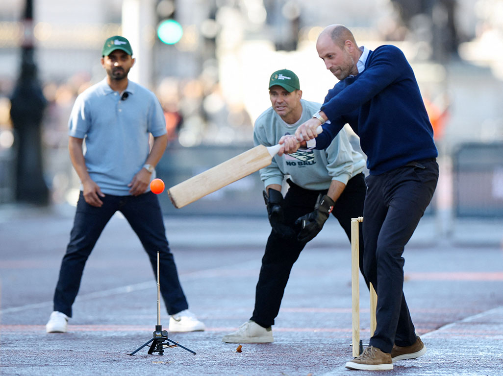 cover Prince William stops traffic outside Buckingham Palace for a game of cricket