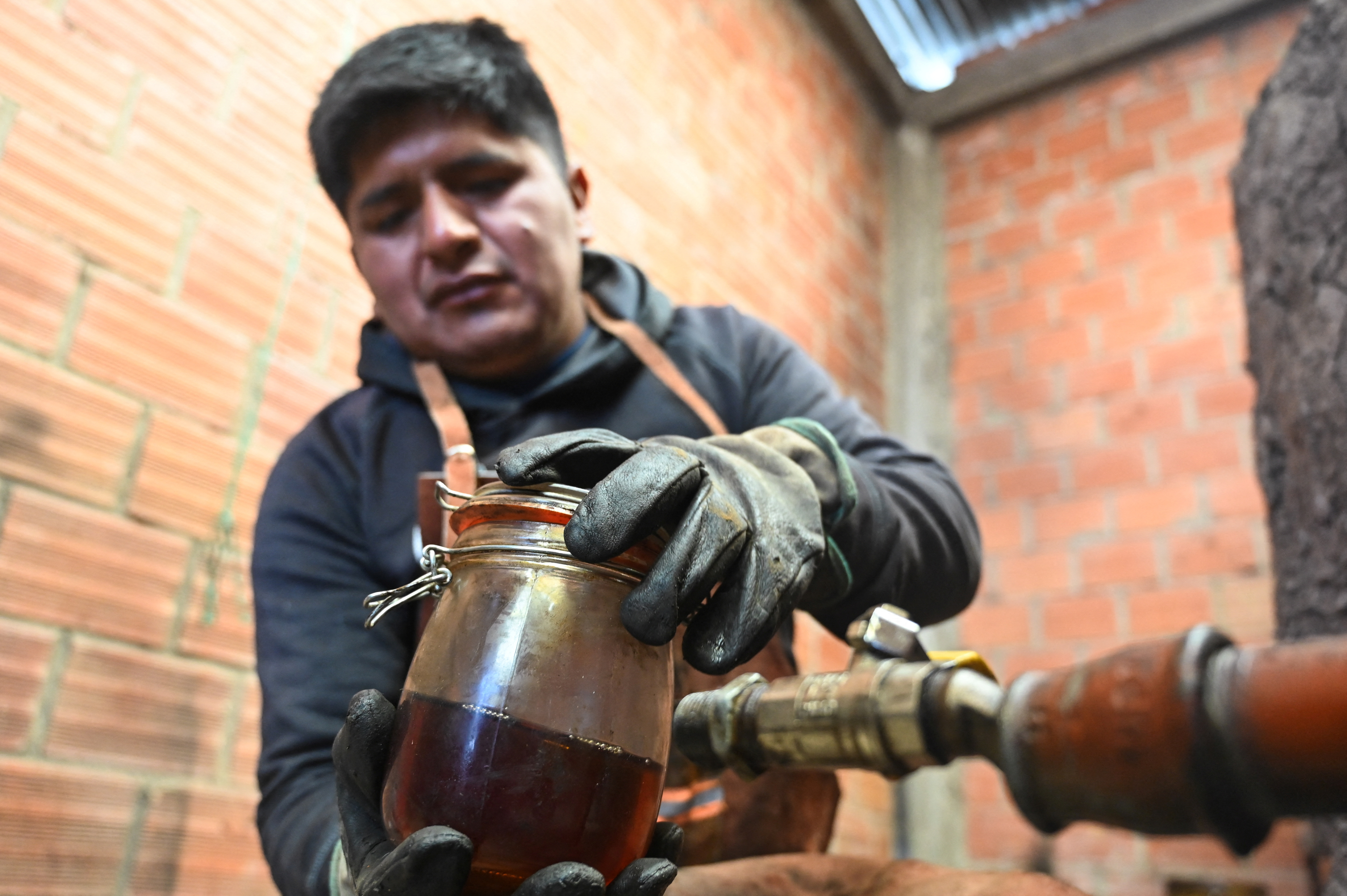 cover As diesel prices soar, Bolivian farmer turns trash into tractor fuel