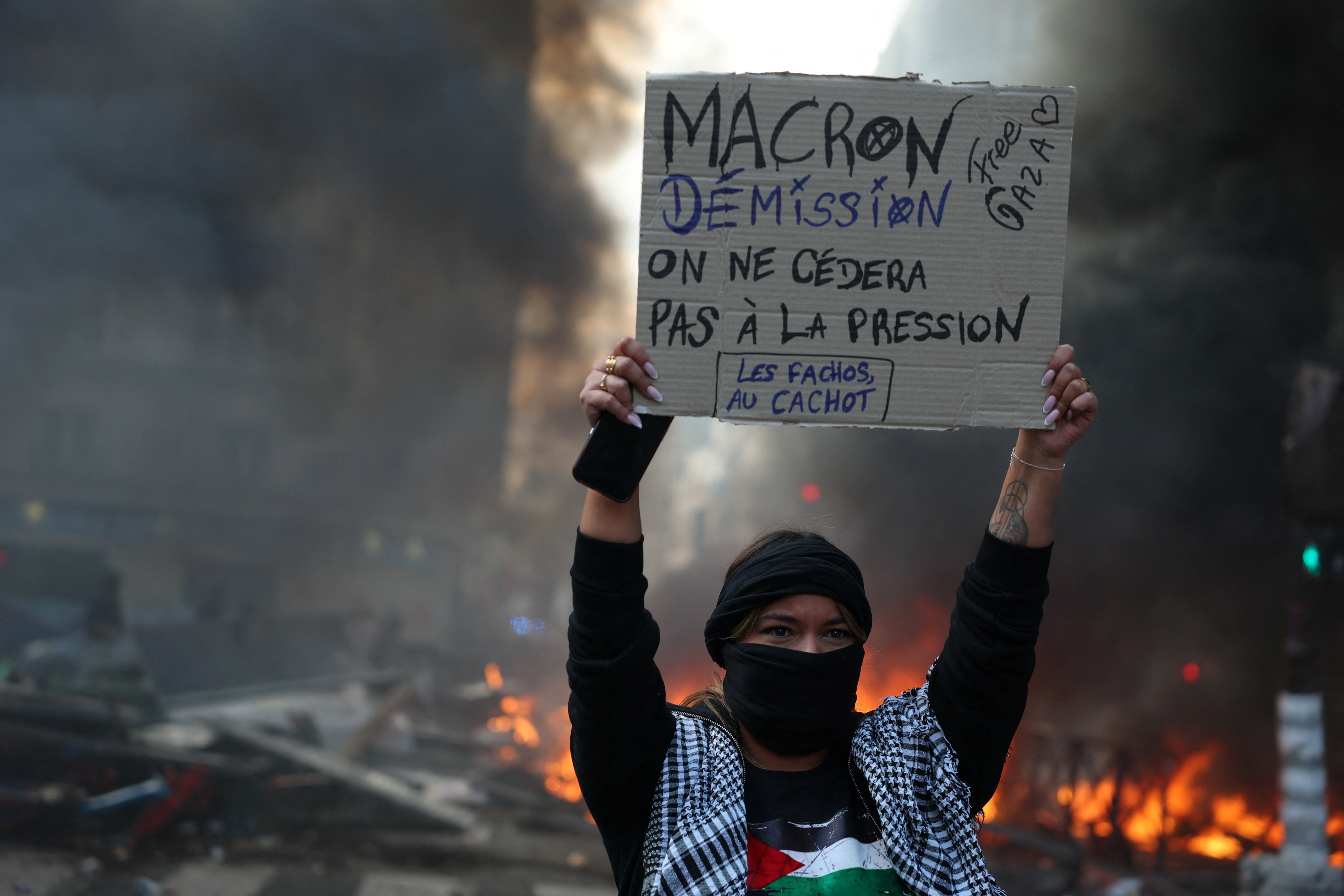 cover Macron urges calm as France counts the cost of worst unrest in years