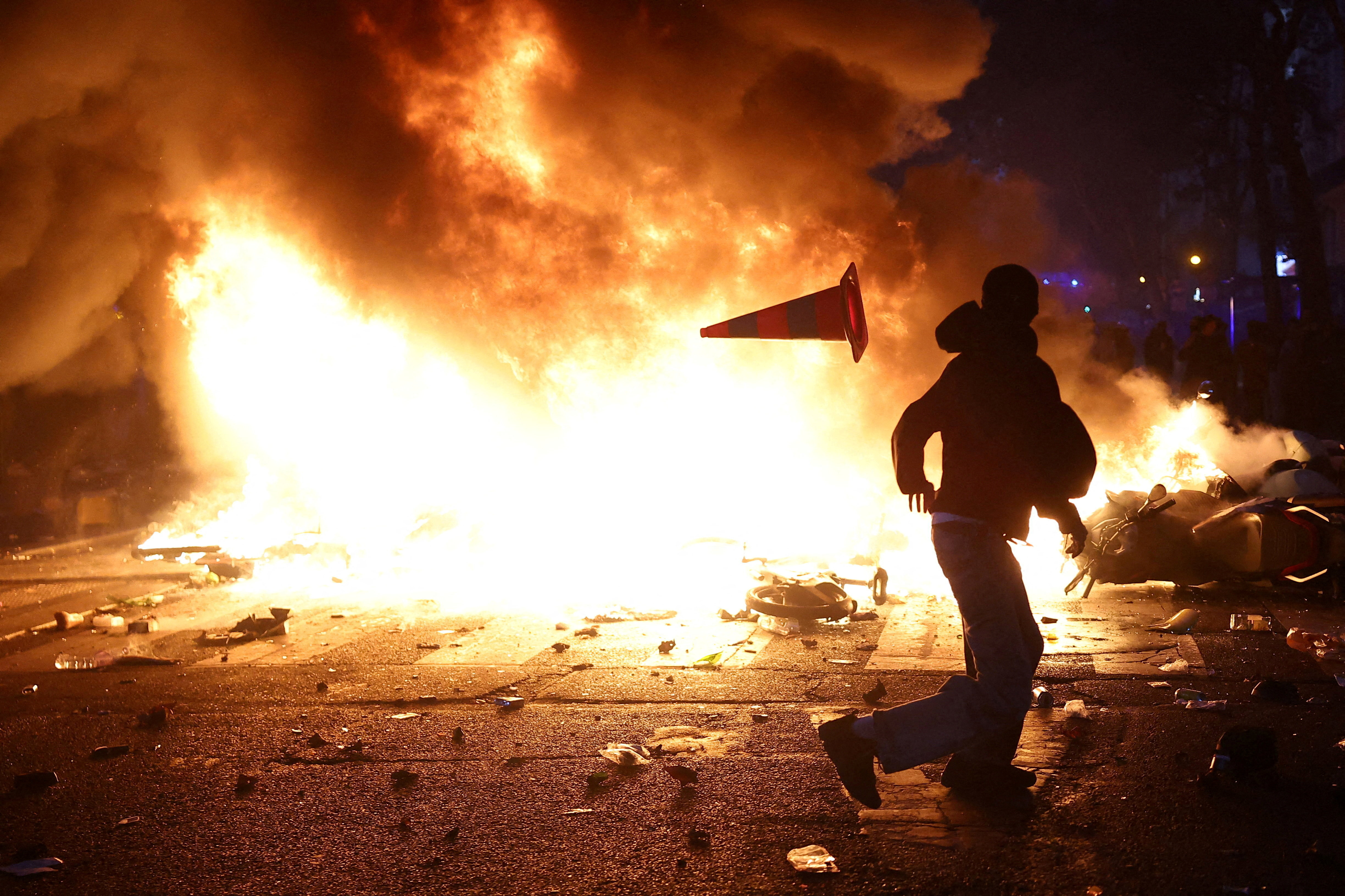 cover Macron vows order, calls foreign criticism of unrest &#8216;stupid&#8217;