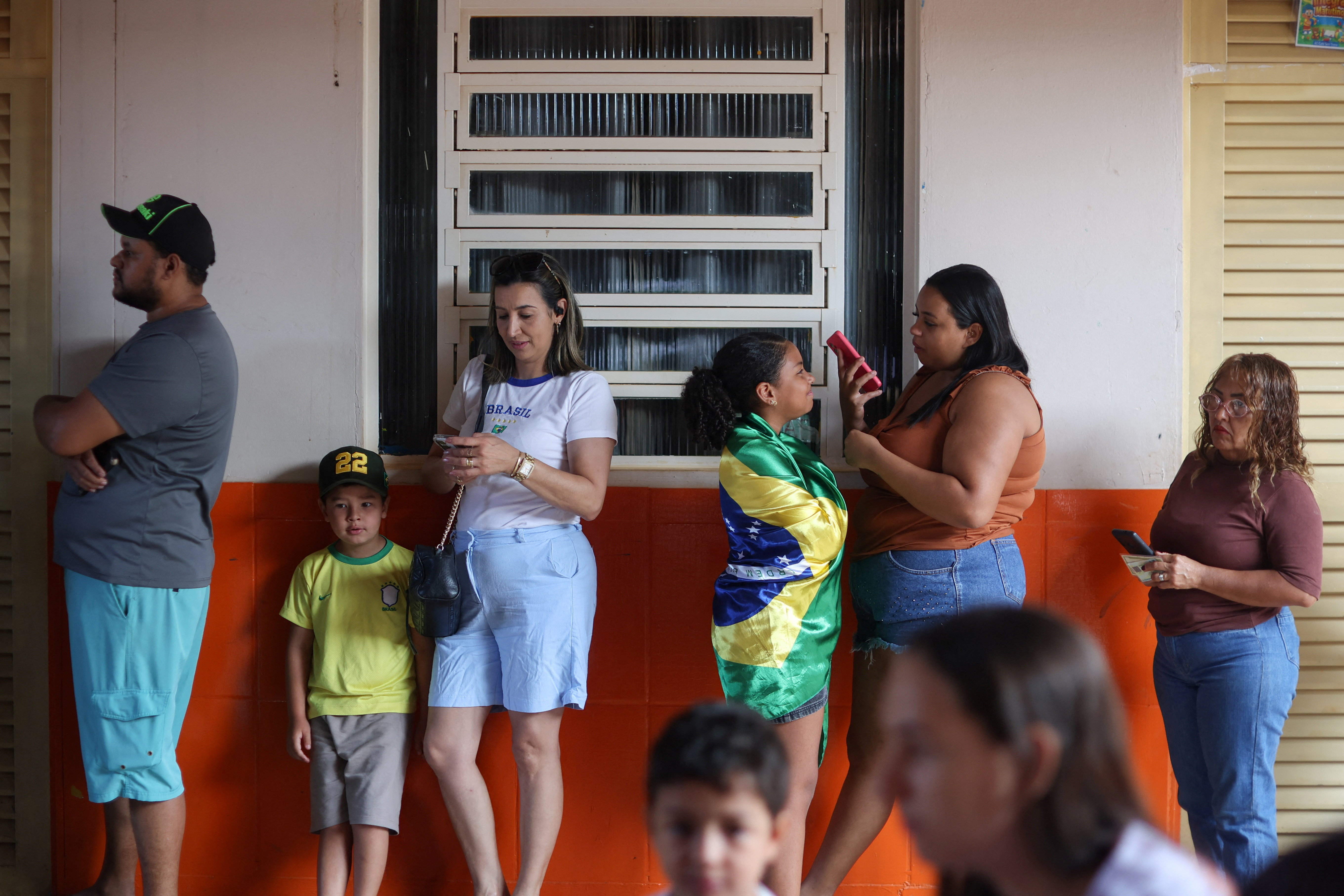 cover Brazil votes in tight runoff between leftist Lula and Bolsonaro Jr.