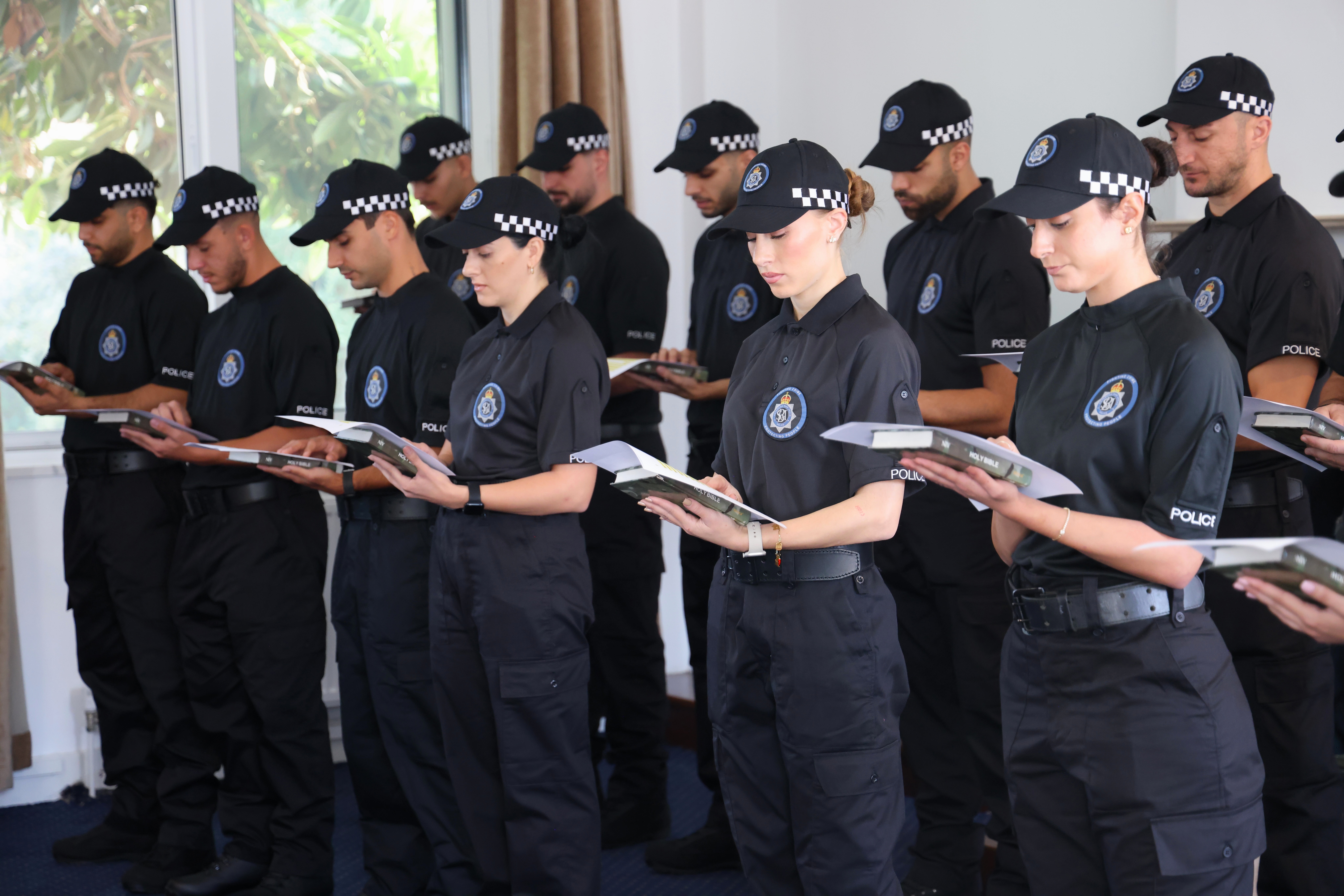 cover Seven SBA police officers graduate as 16 new recruits sworn in