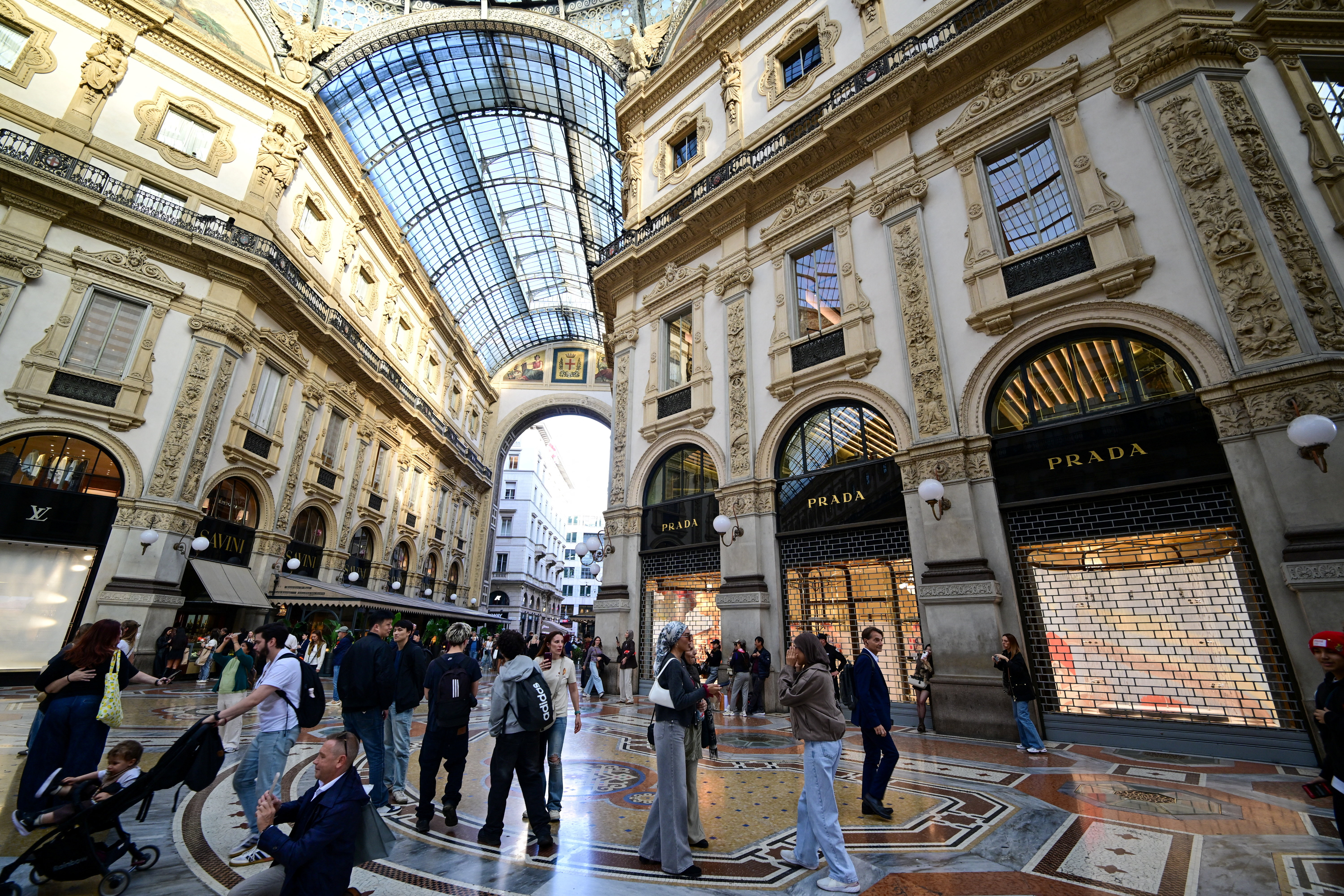 cover Milan luxury shops close for fear of new unrest as government prepares to deploy troops