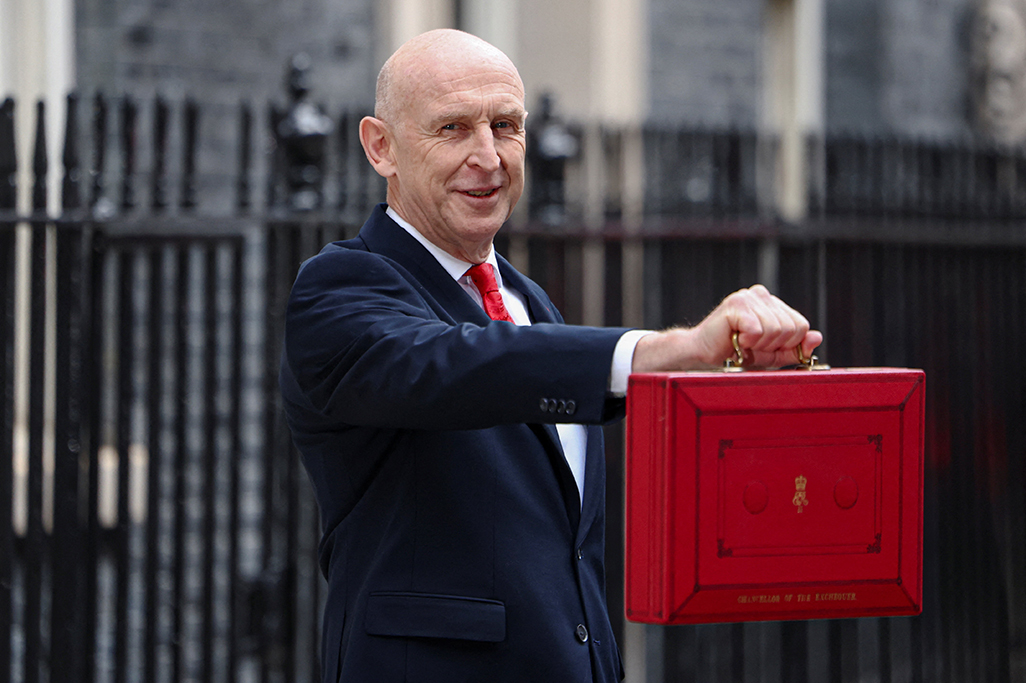 cover Chancellor offers billions of pounds of help for households amid global economic storms