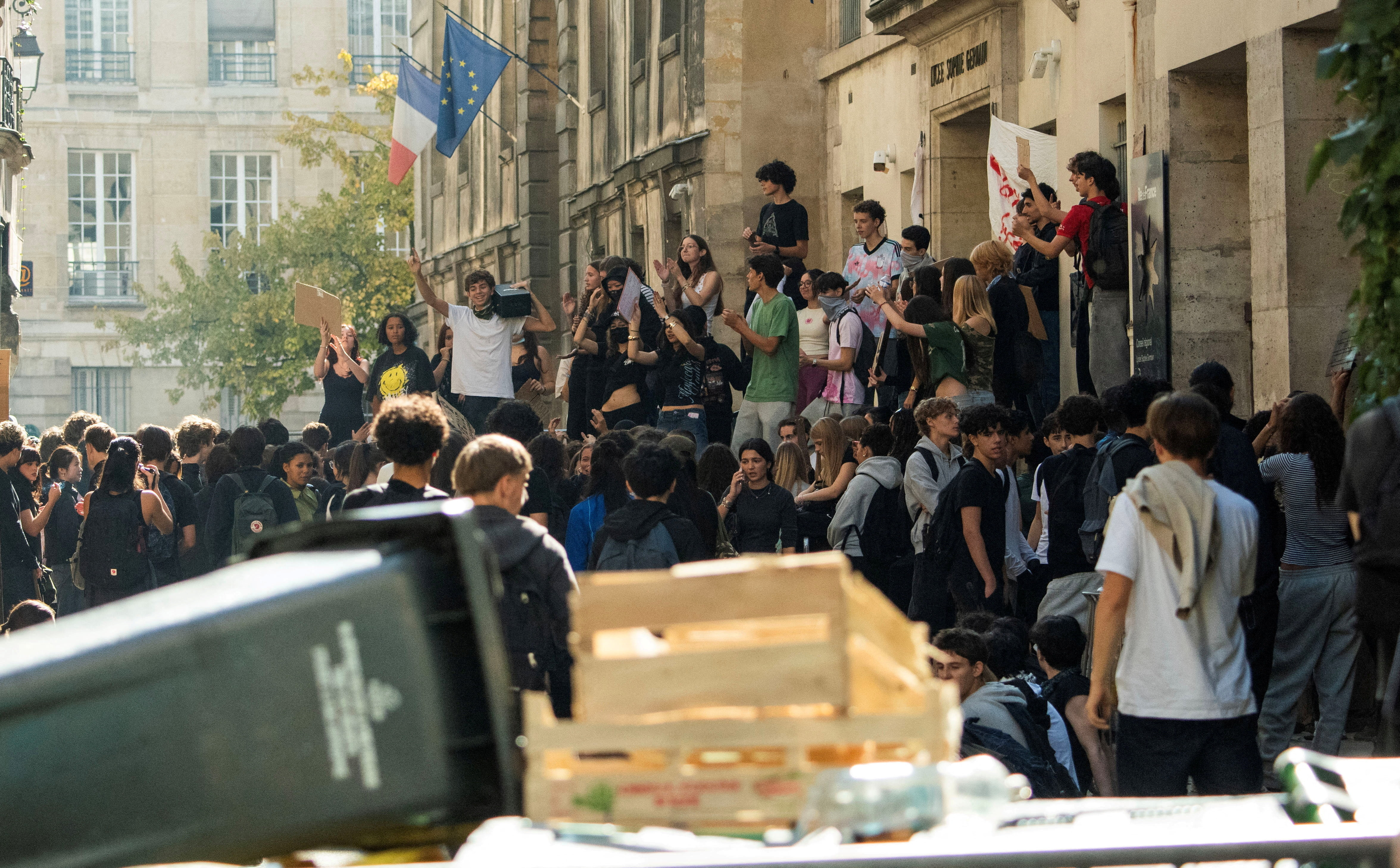 cover Teenager loses hand as French school protests turn violent