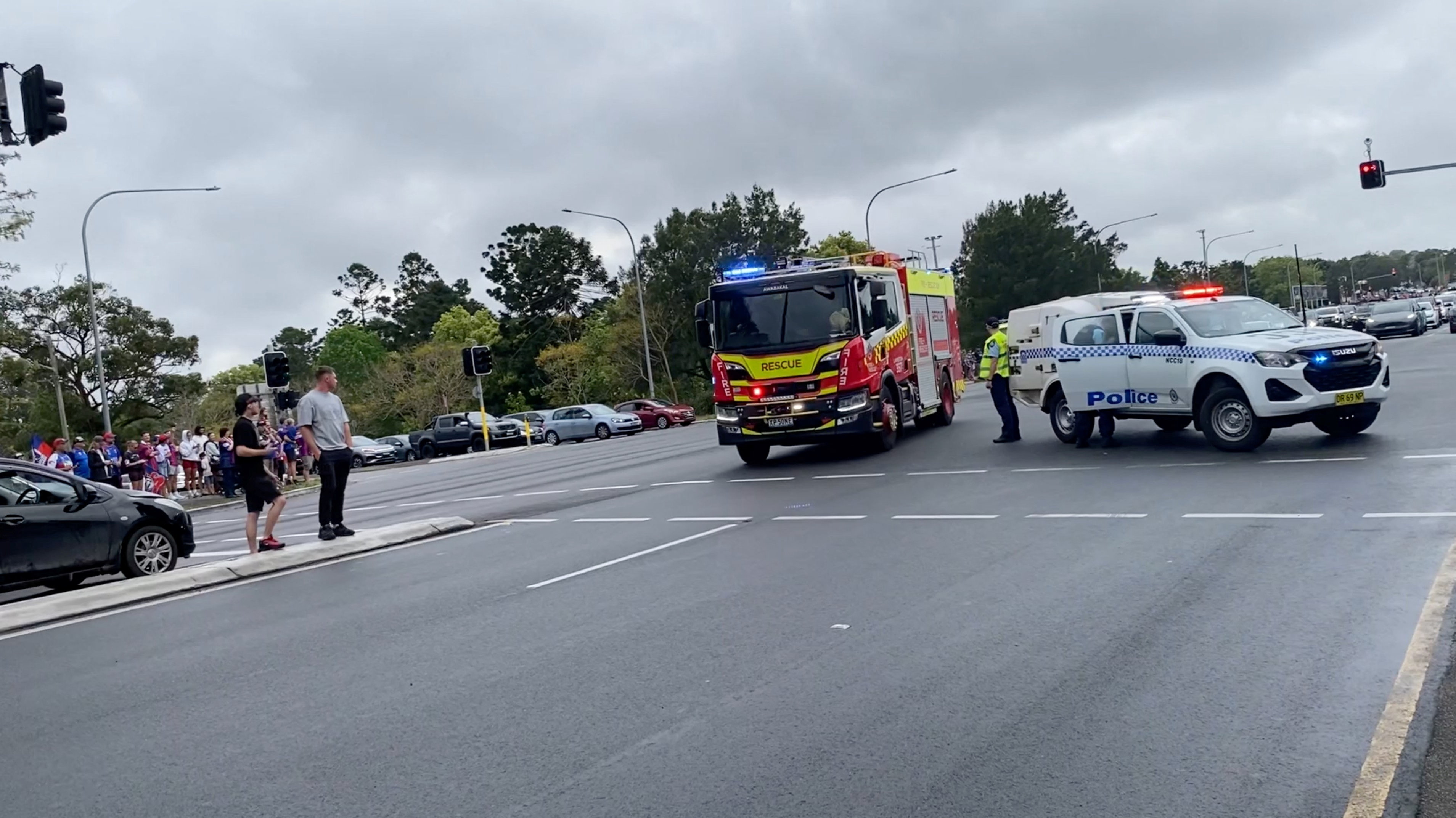 cover Ten injured in Australia as car crashes into crowd north of Sydney